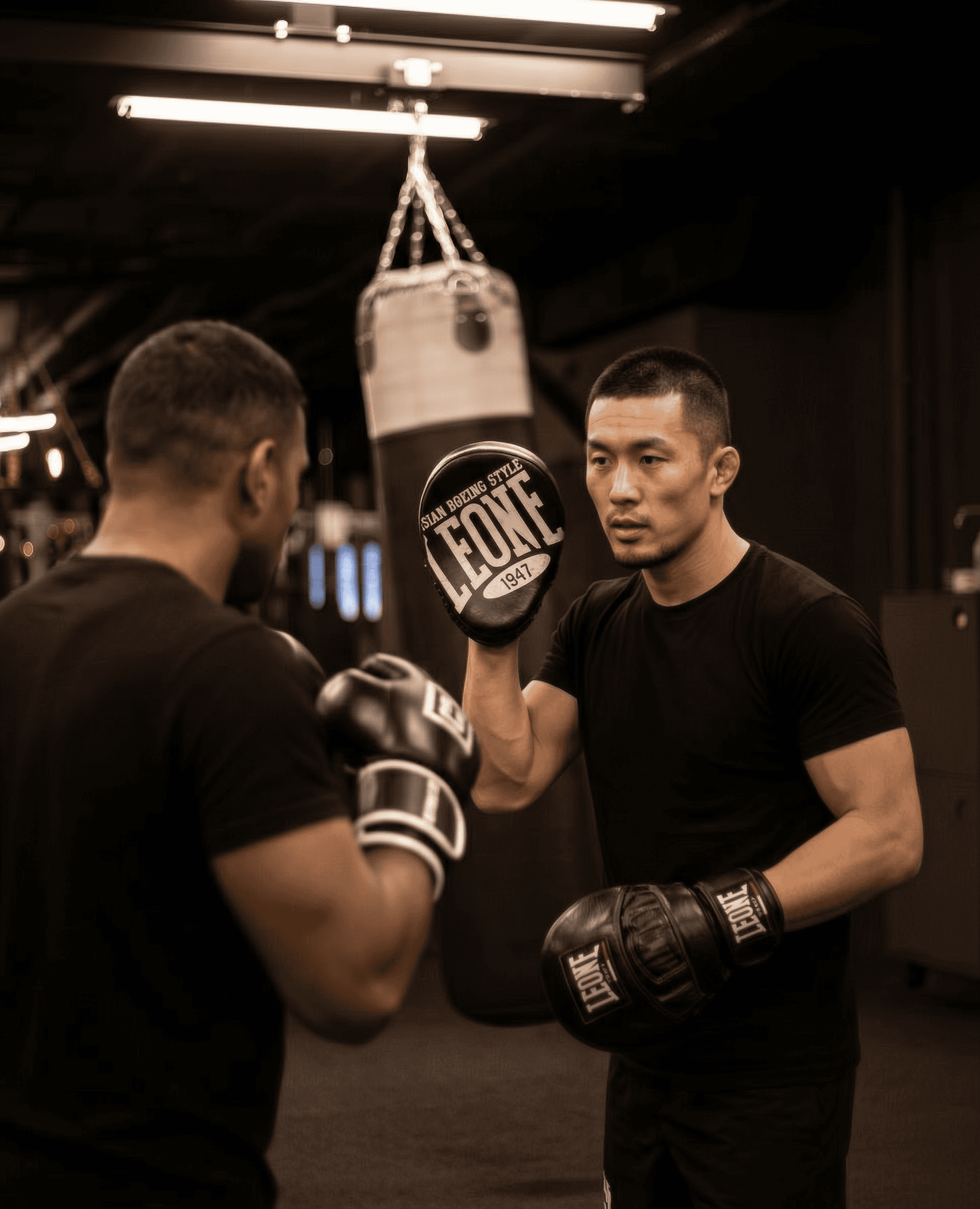 person sitting in a chair in front of a man