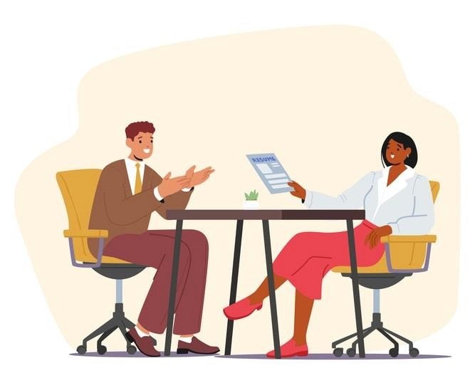 The image depicts a well-organized workspace designed for virtual interviews, featuring proper lighting and a strategically placed camera angle to enhance communication skills. This setup emphasizes the importance of a clean environment and positive first impressions during the interview process.