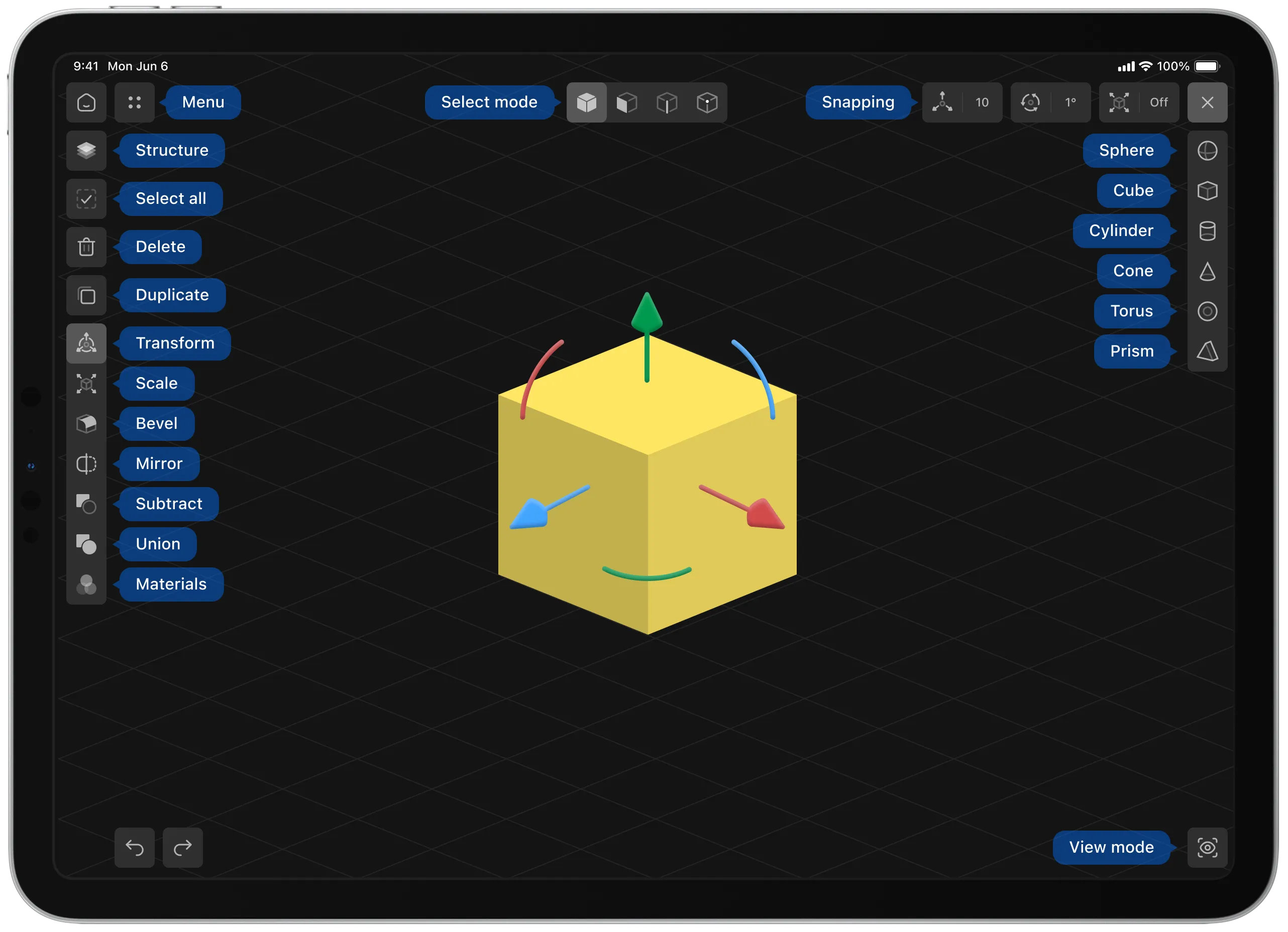 Shapeyard 3D editor main workspace showing a selected cube, transform gizmo, tool panels, primitive controls, and snapping options.