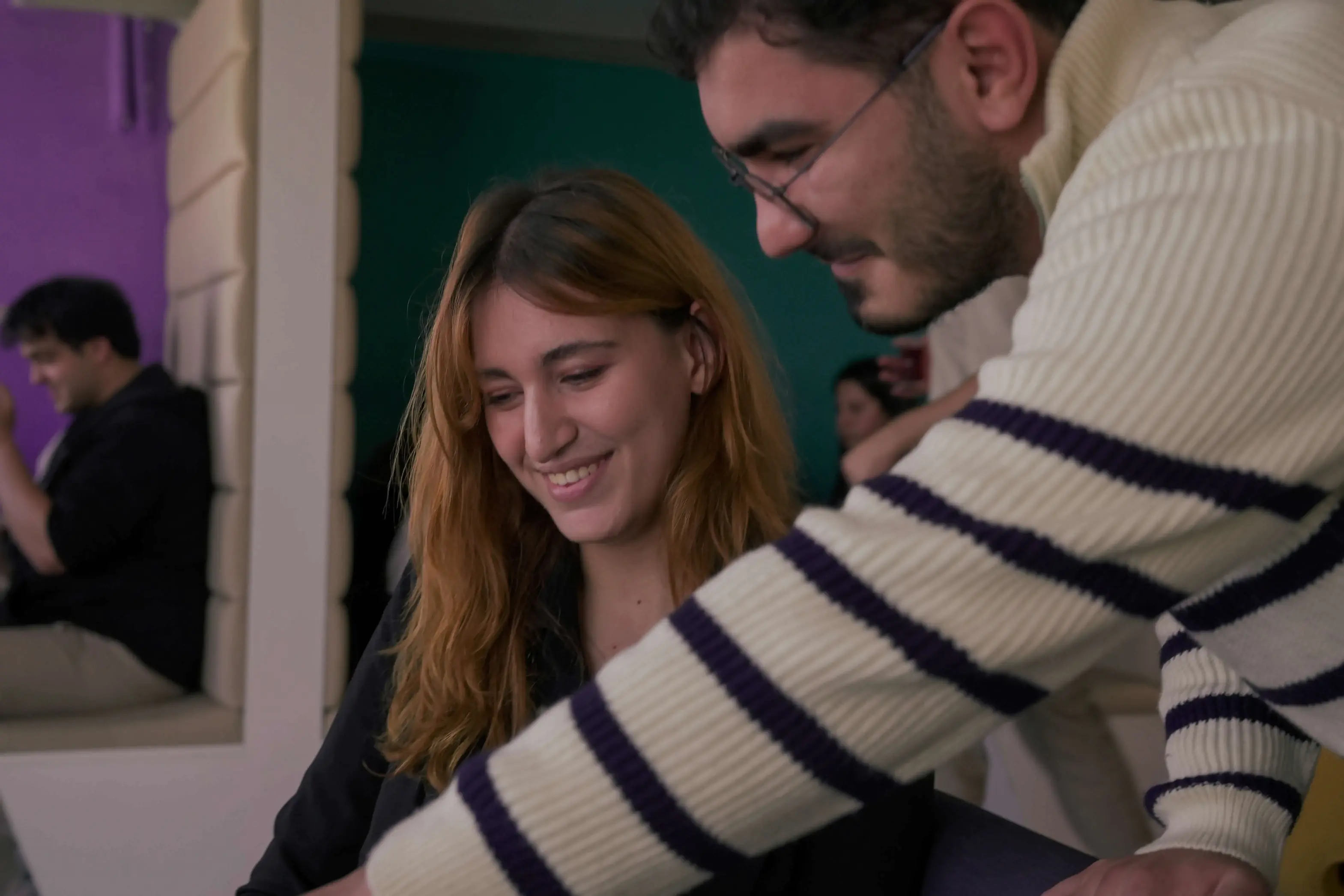 Developer building a Flutter mobile application at the Neon Apps office