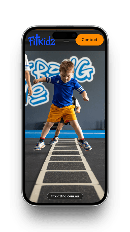 Fitness website designed by a Cairns web design agency displayed on a smartphone for mobile optimisation.