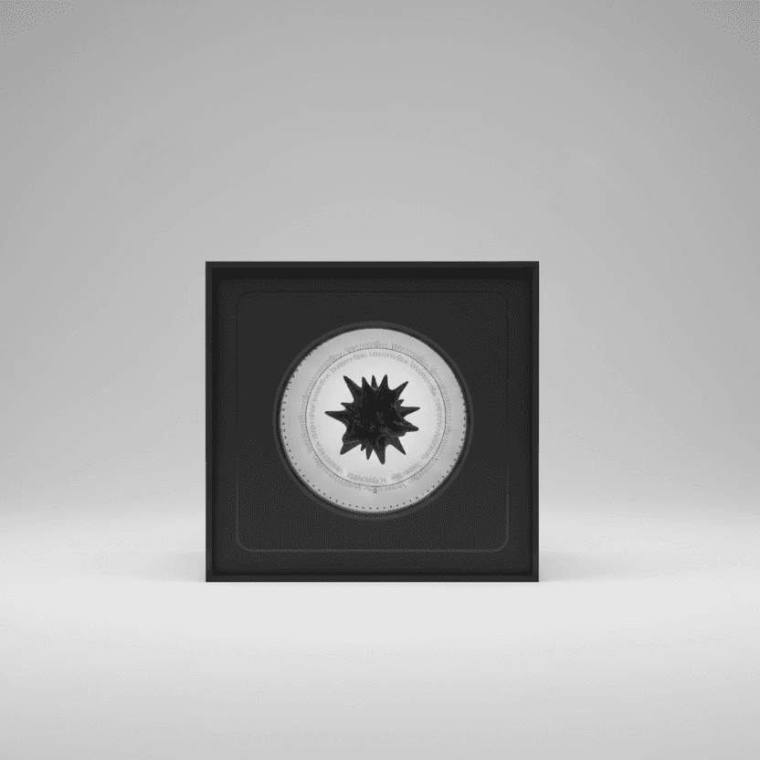 ferrofluid magnetic display reacting to sound in minimal black enclosure