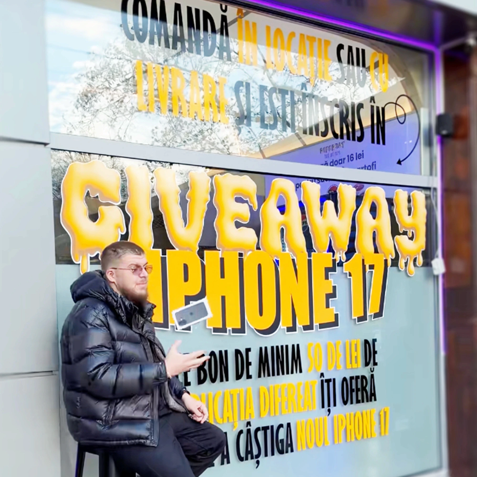 Vitrină colantată Difereat Burgers, campanie giveaway iPhone 17