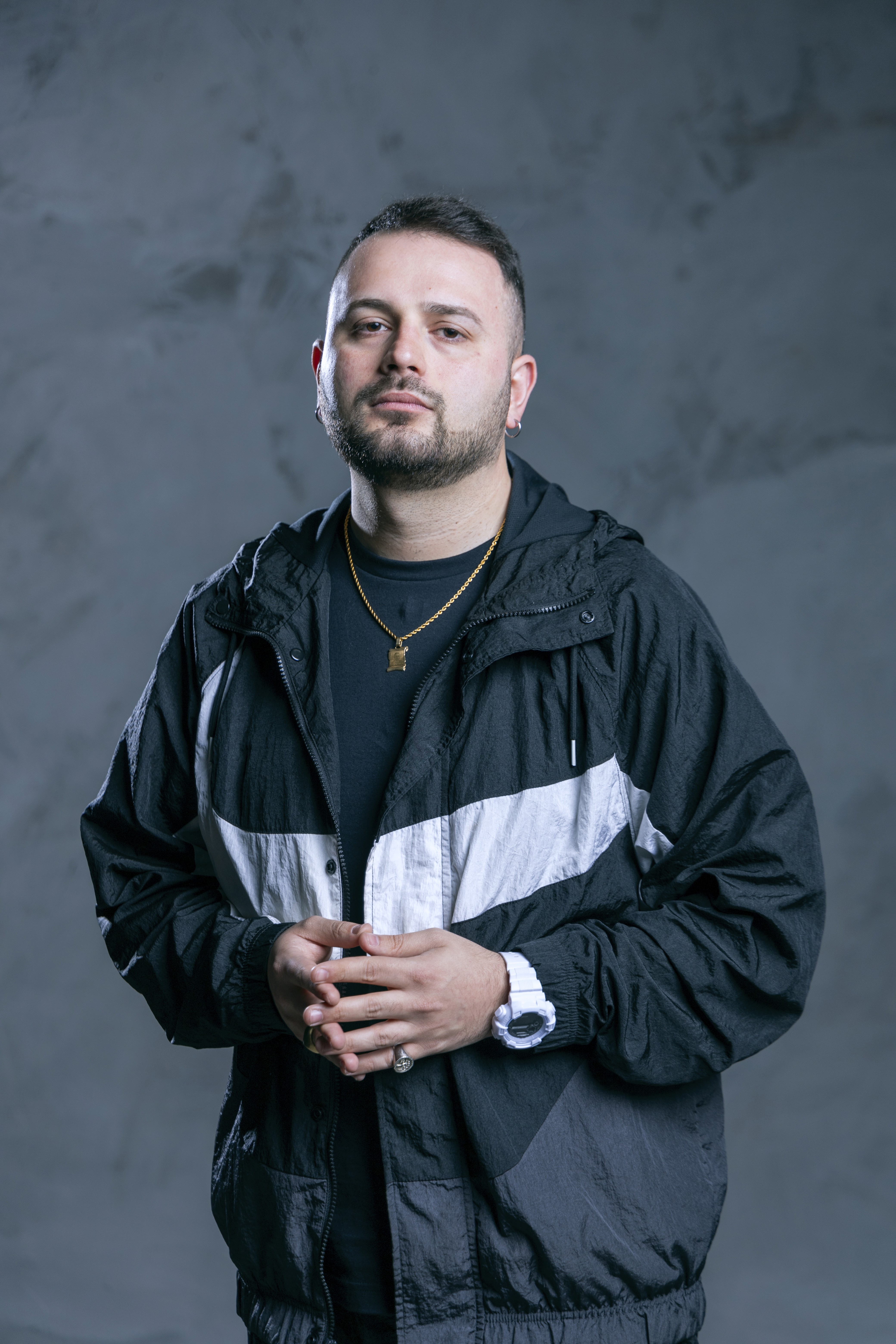 Image of a rapper with headphones