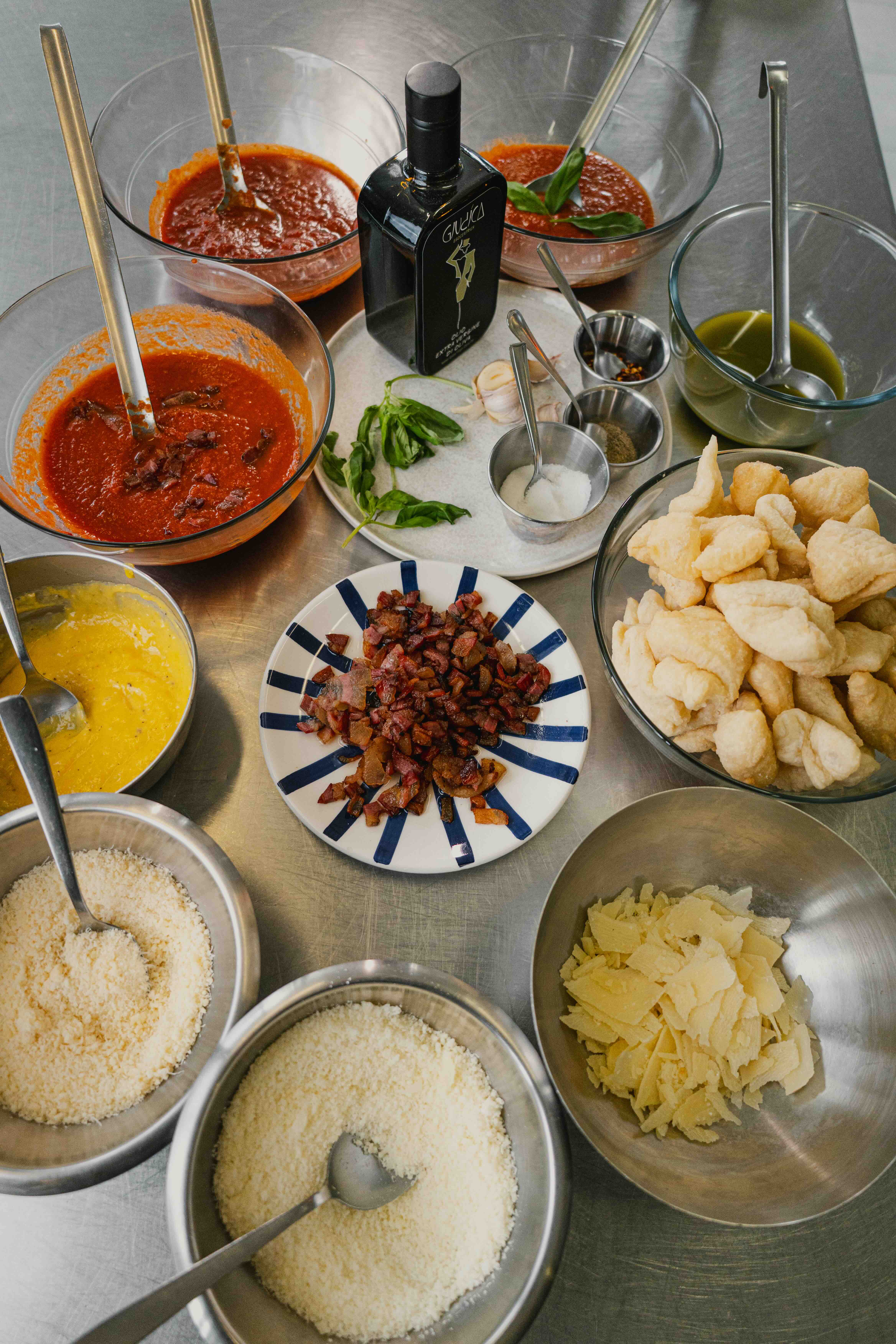 Barista pouring milk into latte with art