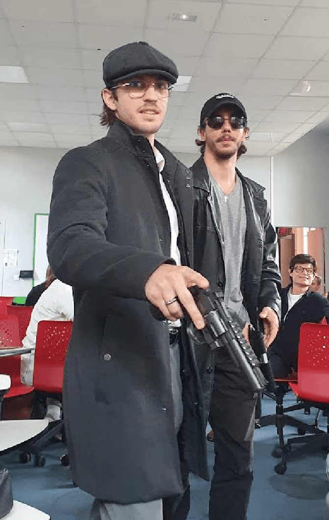 A picture of me (Axel Dufour) and a close friend of mine (Jan Hublart) both disguised as police inspectors. We were having a course presentation , but were allowed to unleash our creativity !