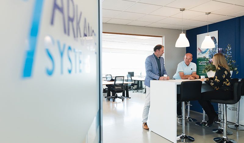 Office of Arkance Systems with people working