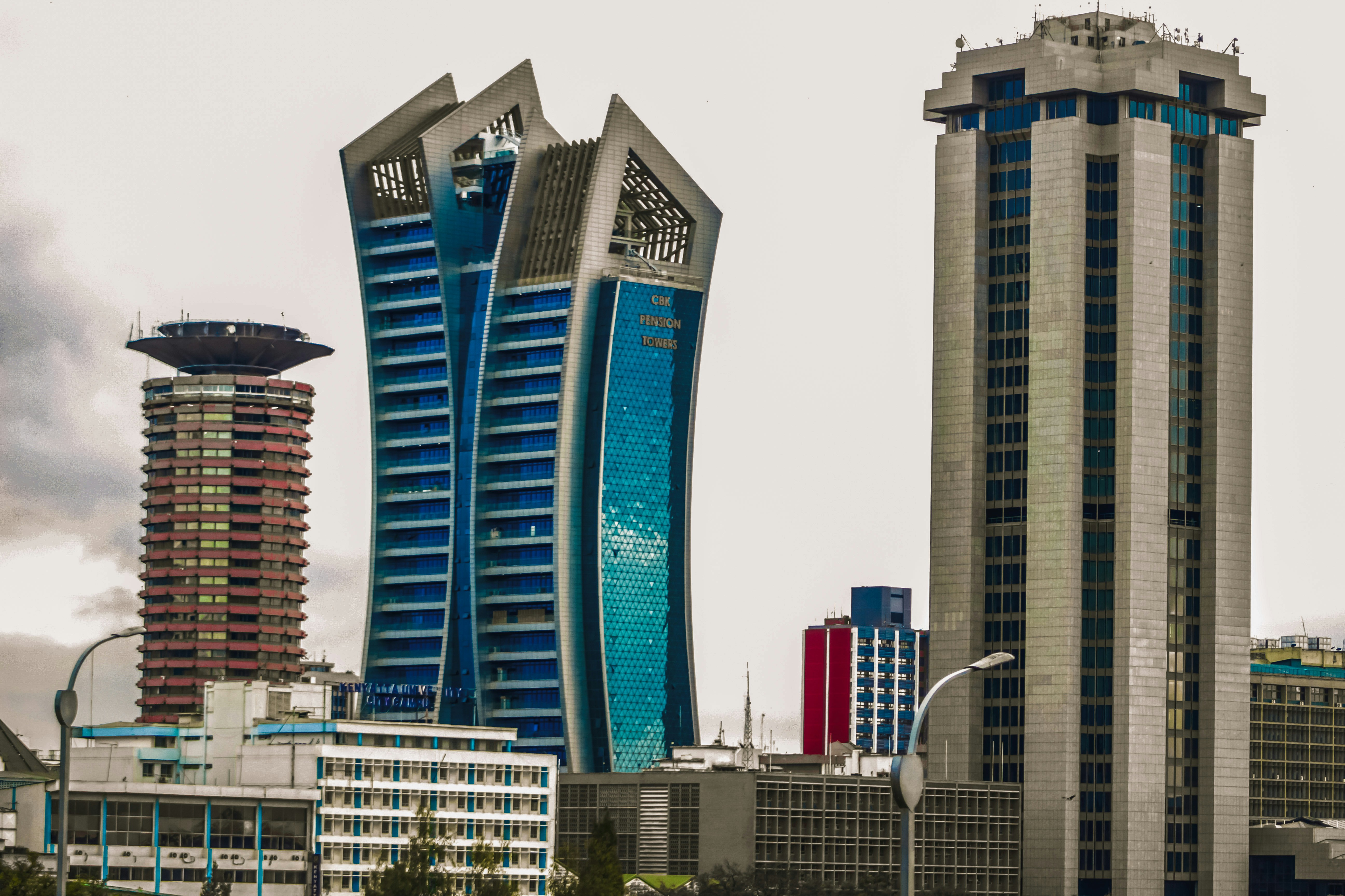 A group of tall buildings sitting next to each other