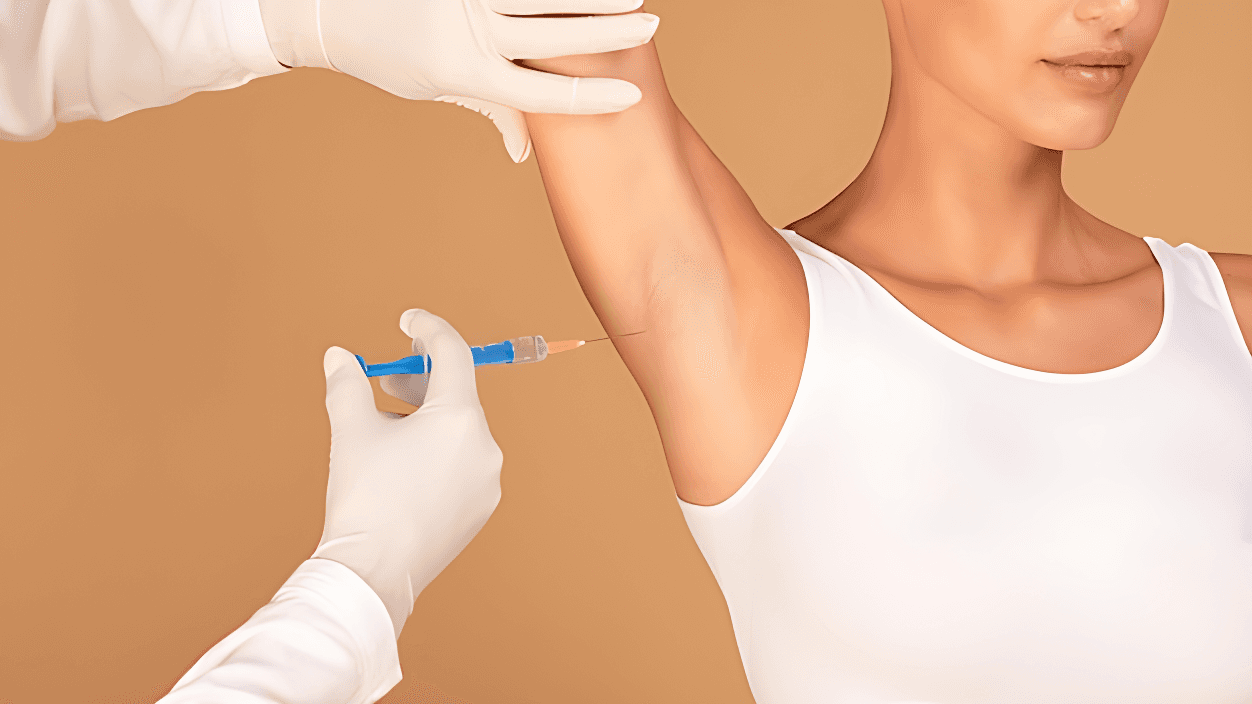 Medical professional administering Botox injection into a patient’s hand to treat excessive sweating and provide hyperhidrosis relief for hands and underarms.