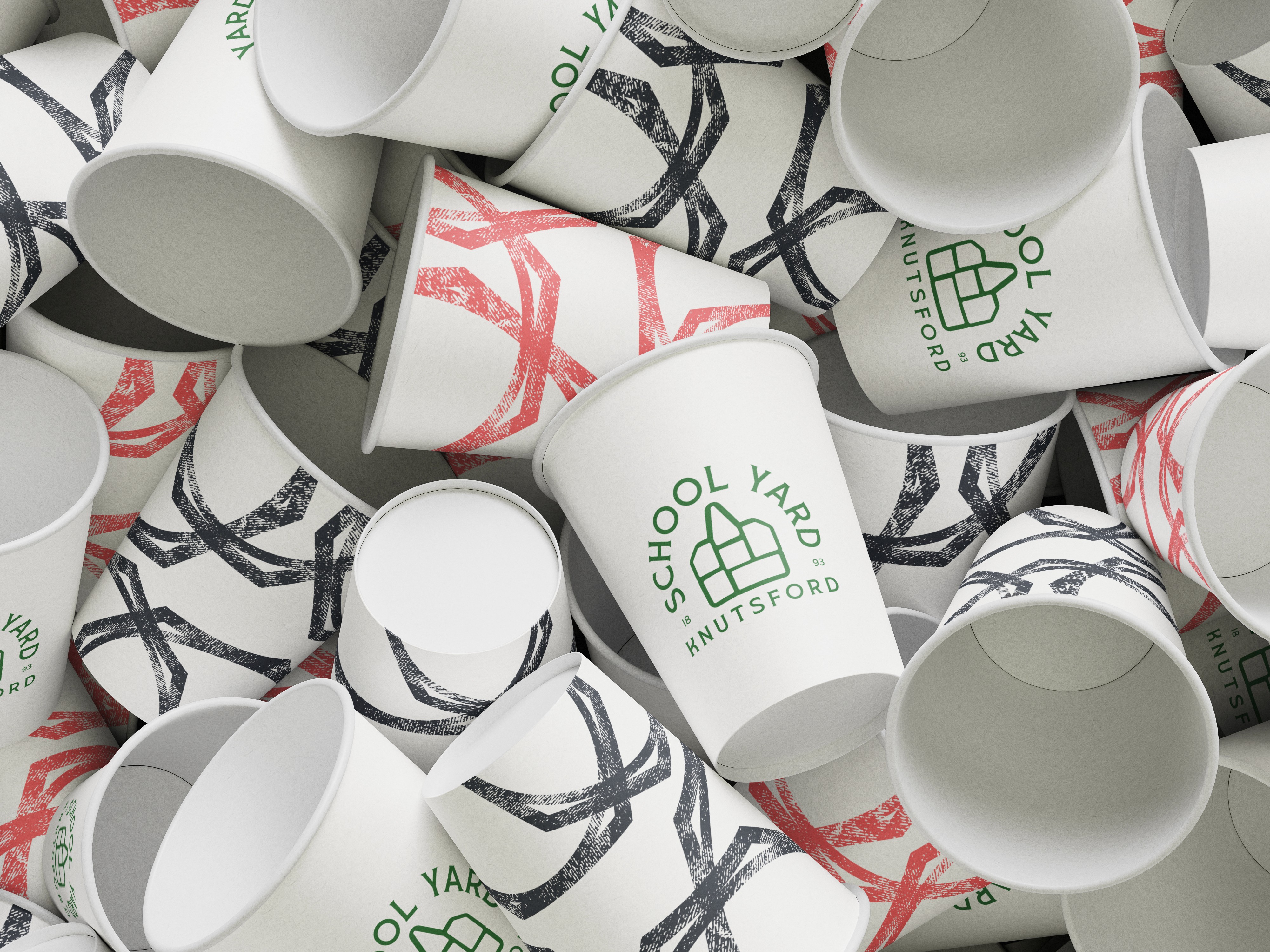 Modern home office setup with a monitor, ergonomic chair, keyboard, and indoor plants near a window with blinds.