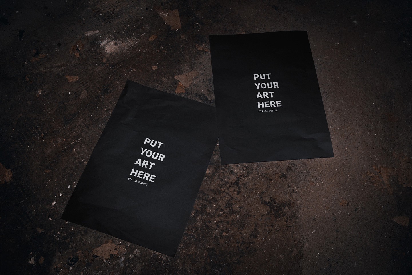 Basement A3 poster mockup showing two blank posters placed on gritty floor