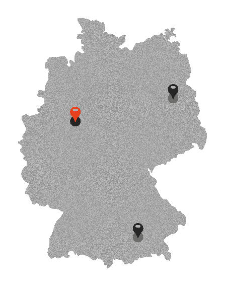 a blurry photo of a person standing in front of a wall