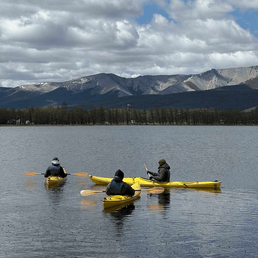 People Kayaking on Khuvsgul lake in Mongolia