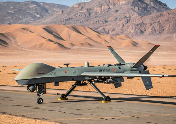 person sitting in a chair in front of a man
