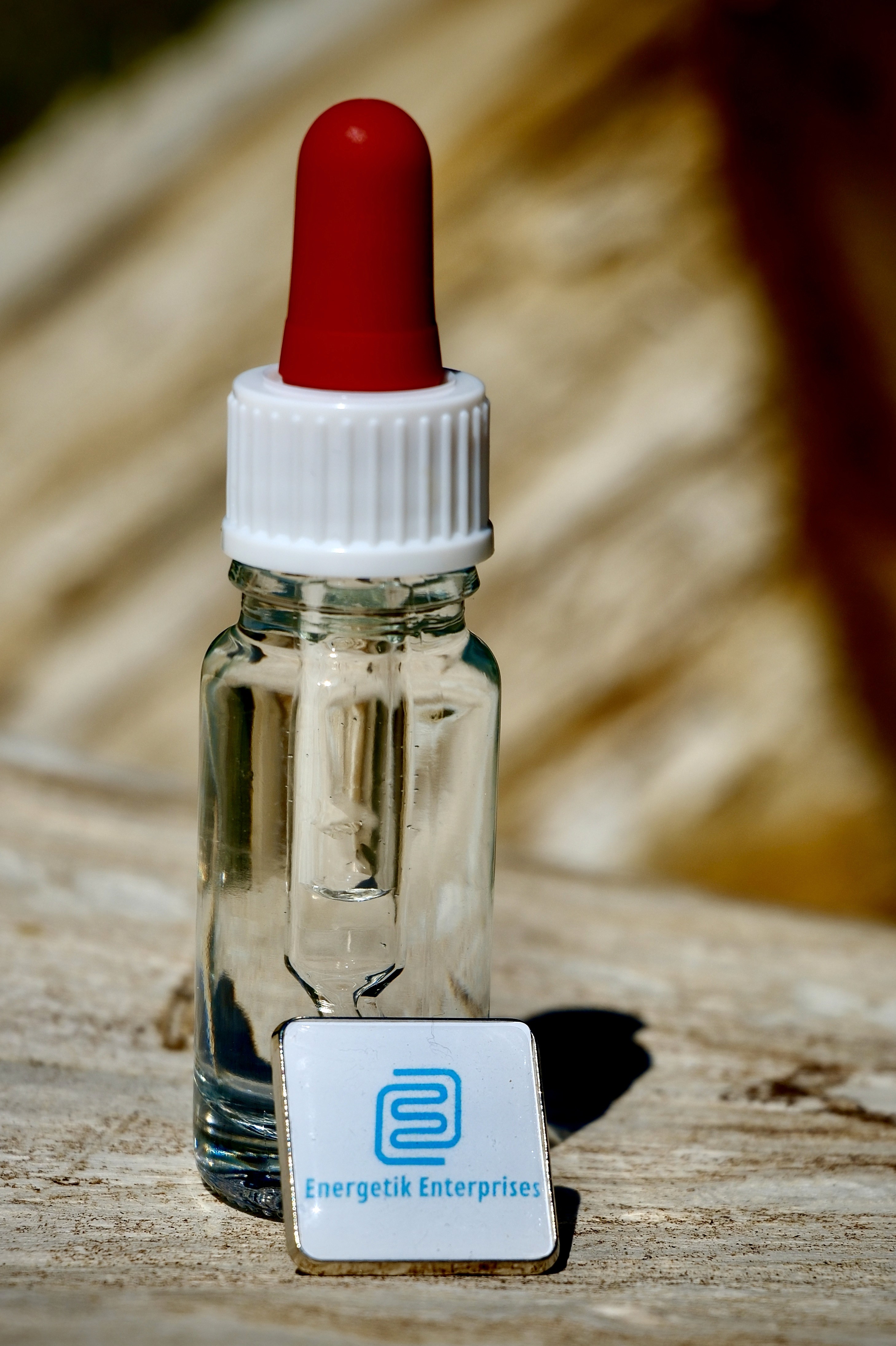 A serene spa setting with two lounge chairs beside a warm, reflective pool and soft, natural lighting.