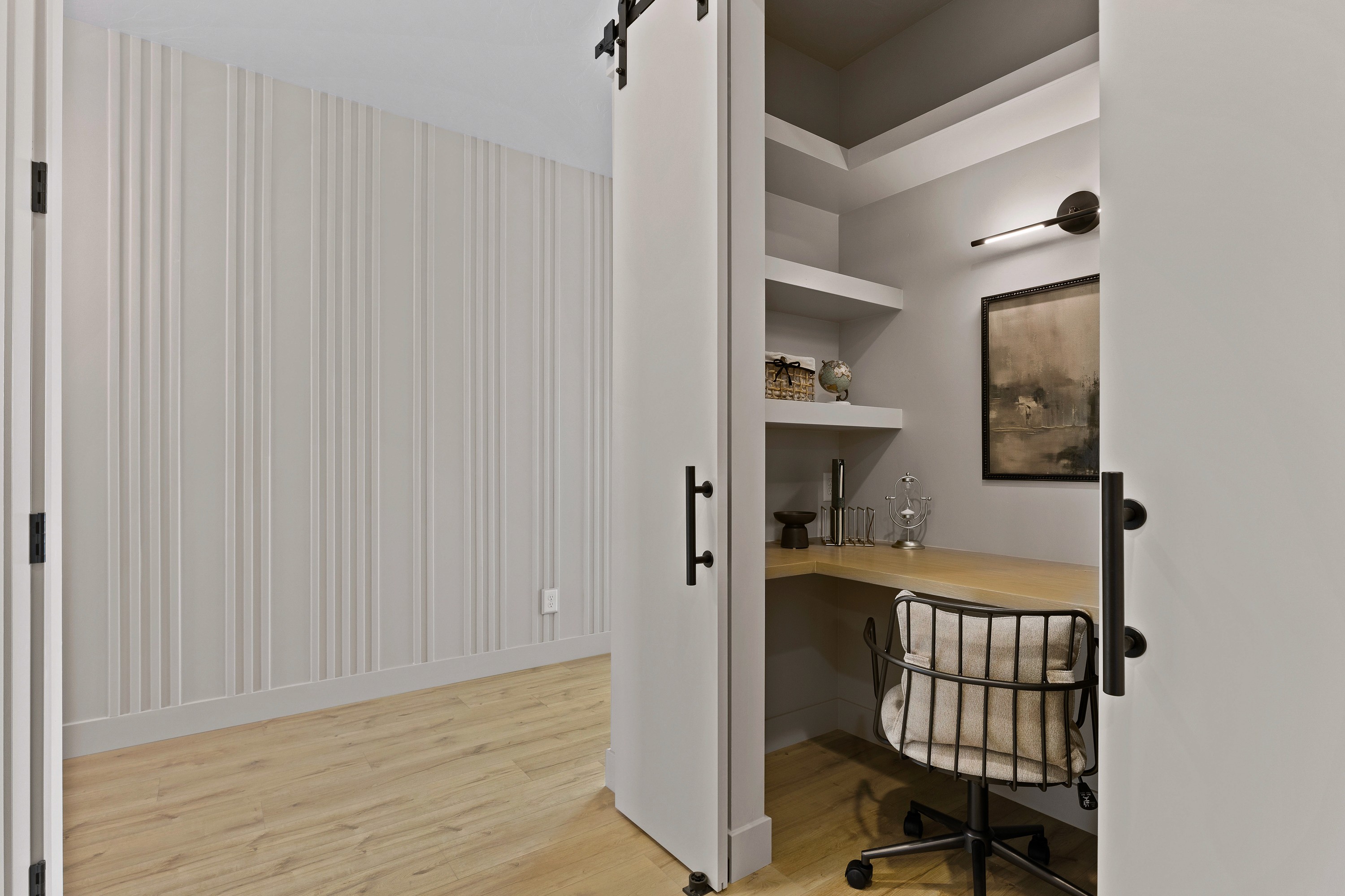 Hall desk/office area in the BYSO House in Hurricane, Utah with built-in desk and cabinetry.