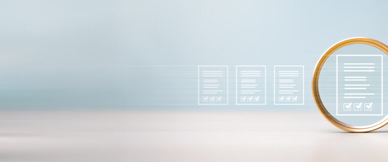 magnifying glass on documents