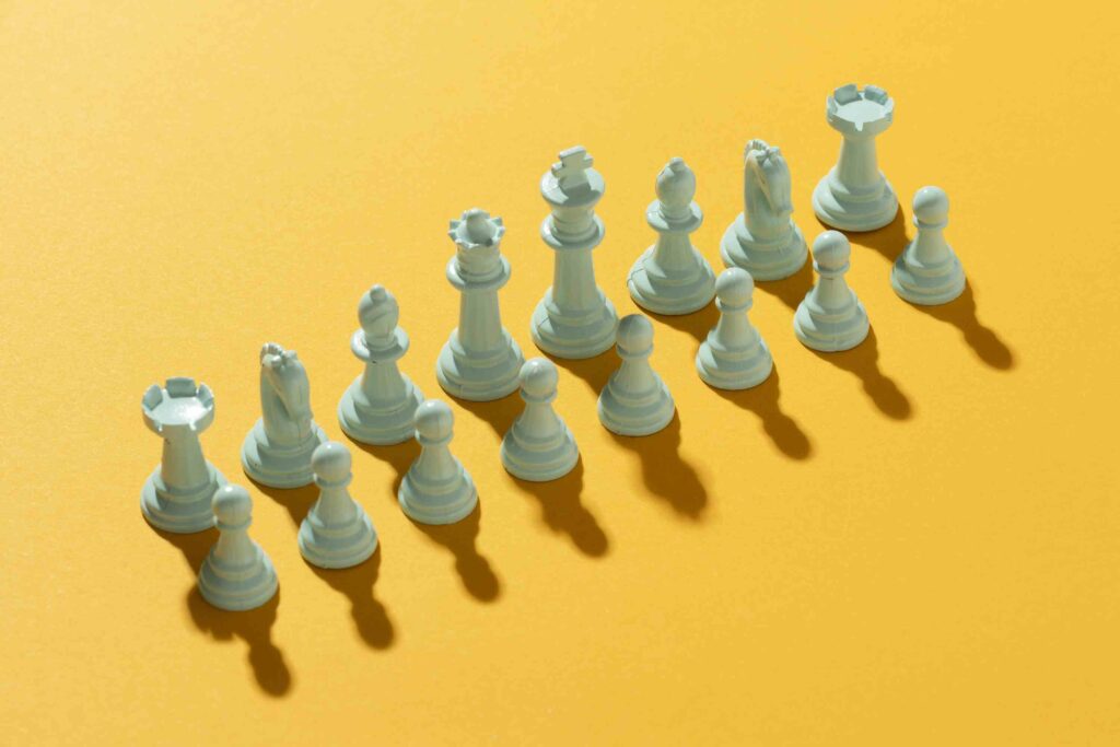 White team chess on a yellow background