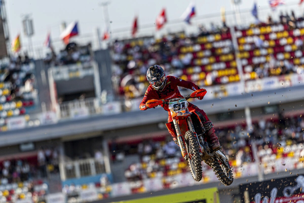 Jeremy Seewer of the Van Venrooy KTM Racing Team launches over a jump during the MXGP of China, riding his KTM machine in front of packed grandstands.
