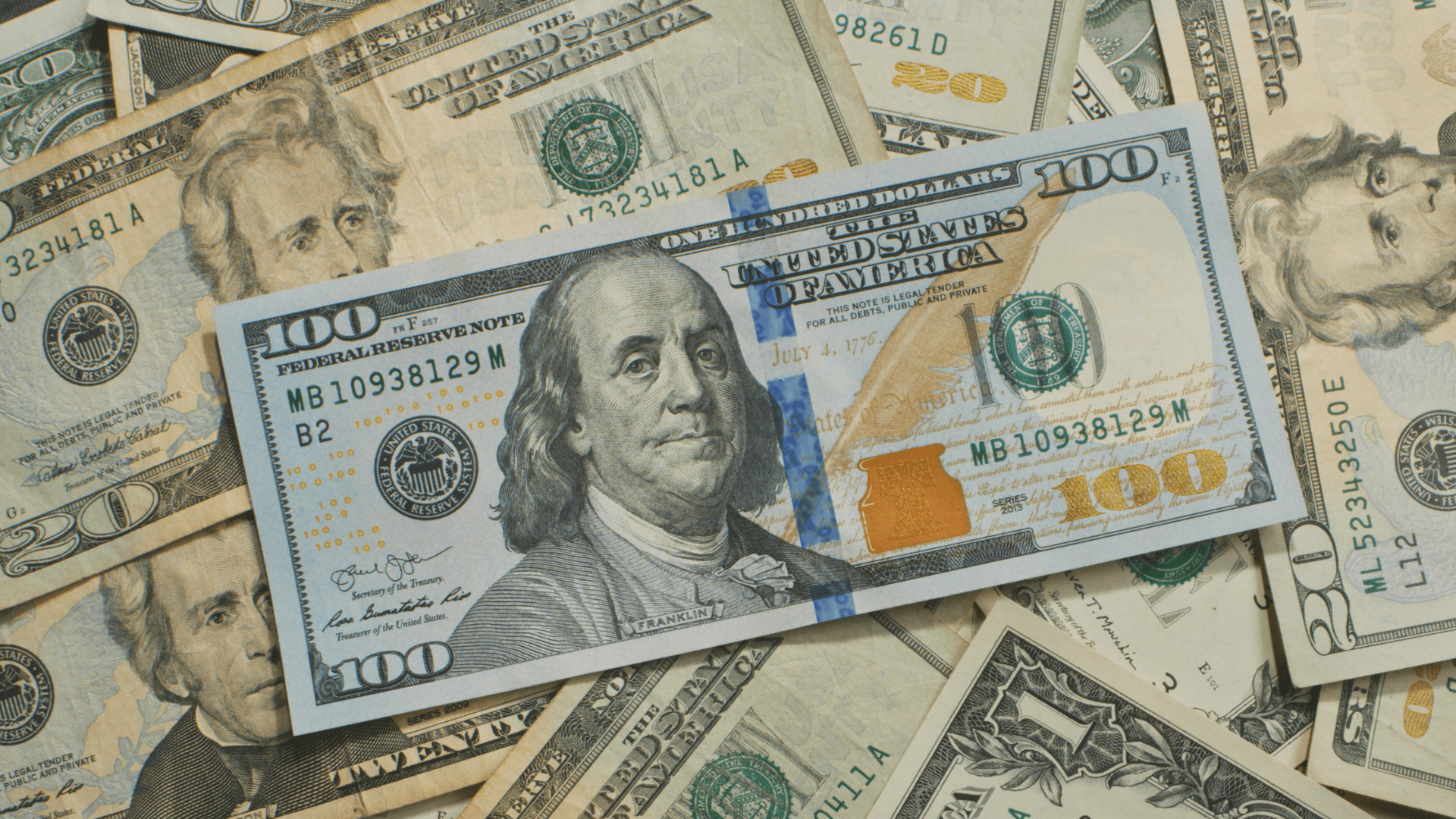 selective focus photography of woman holding camera gimbal