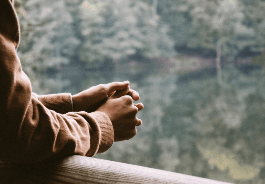 person relaxing outdoors symbolizing mental wellbeing during weight loss
