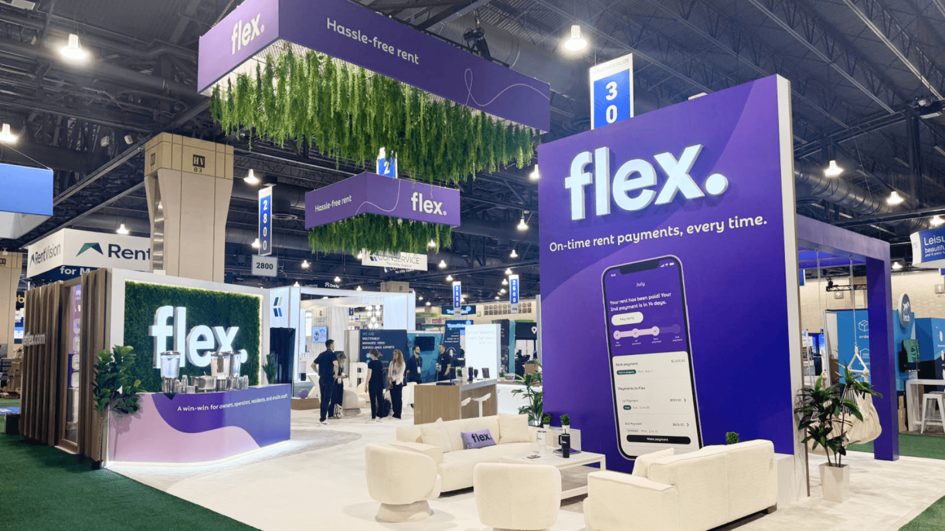 Custom trade show booth build las-vegas with large hanging sign and union installation