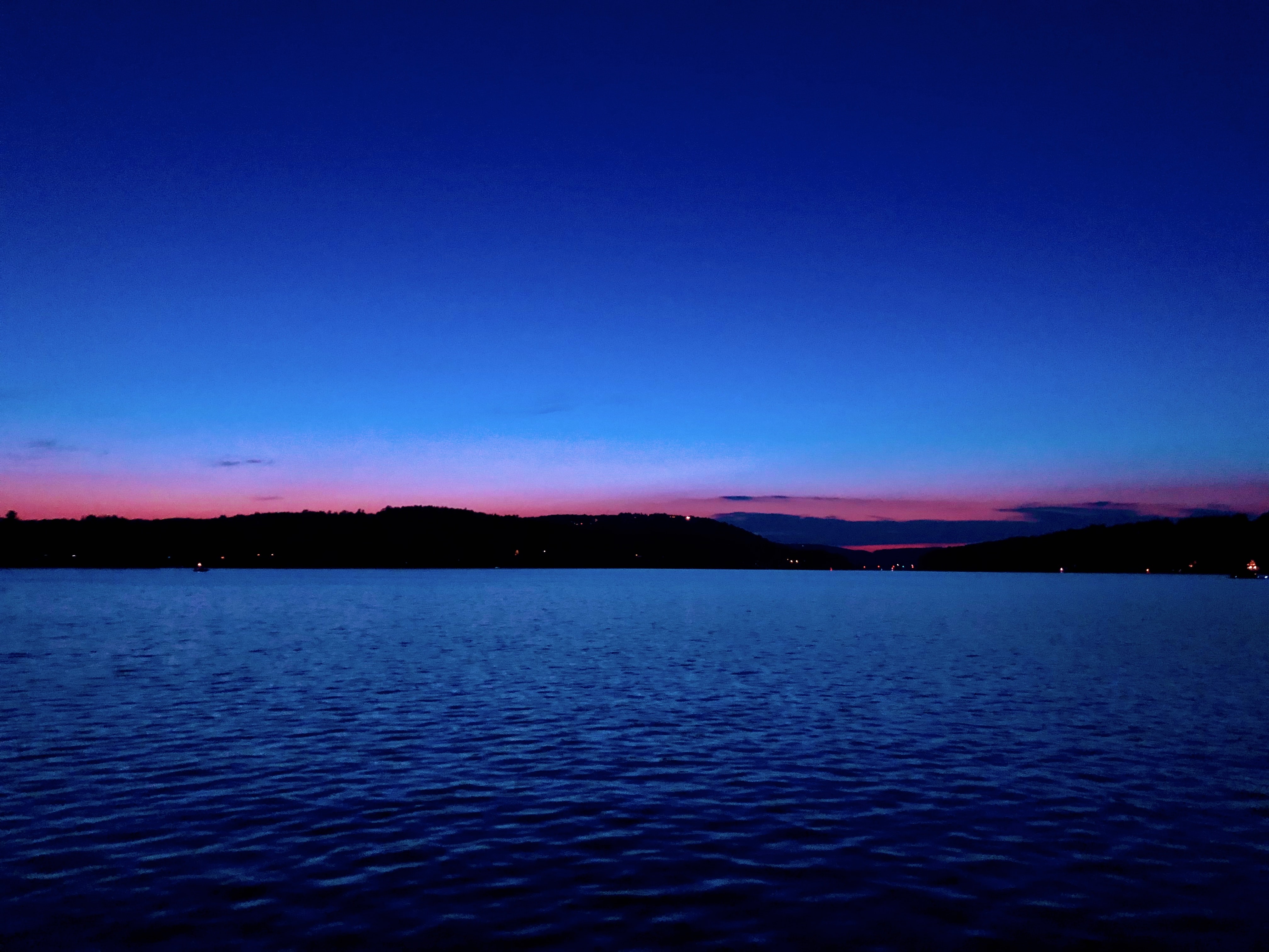 Blue, pink, indigo sky over Deep Creek Lake, Maryland, USA