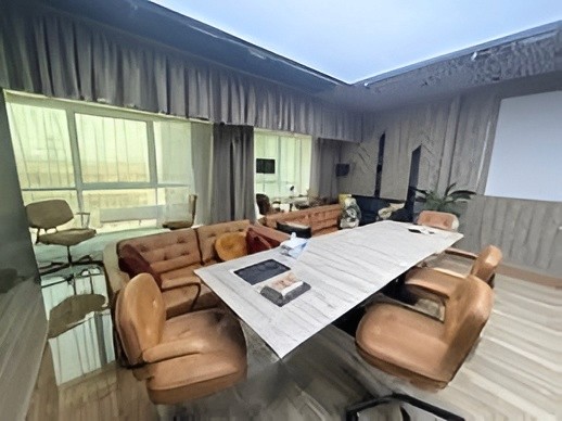 Fully furnished modern meeting room and office interior inside a professional business center.