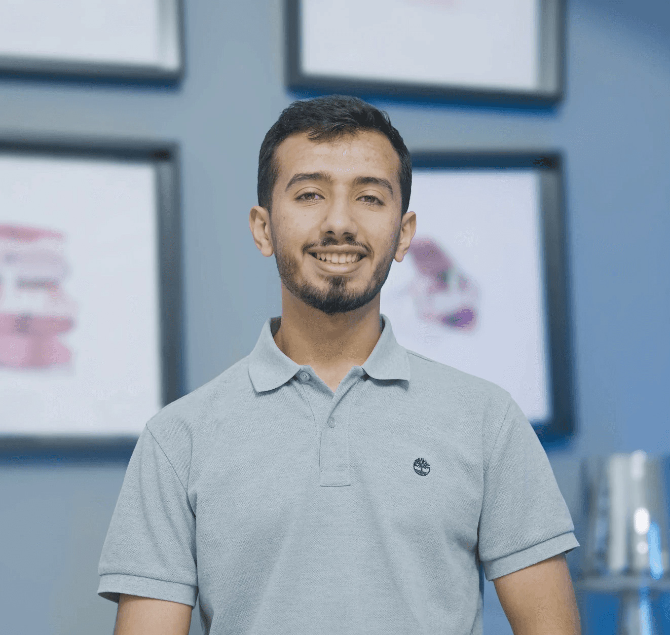 Black and white portrait of a man with a beard and glasses