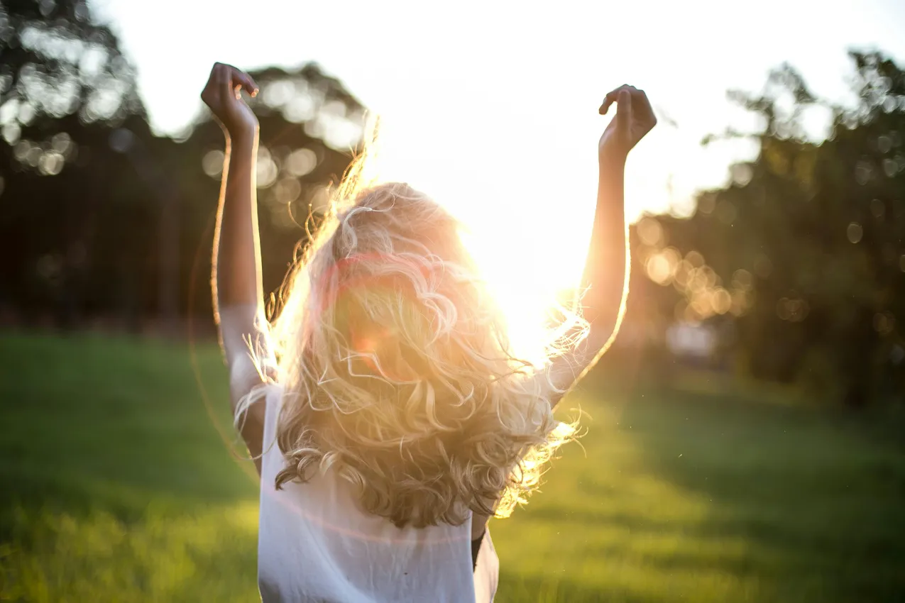 happy woman in sunshine