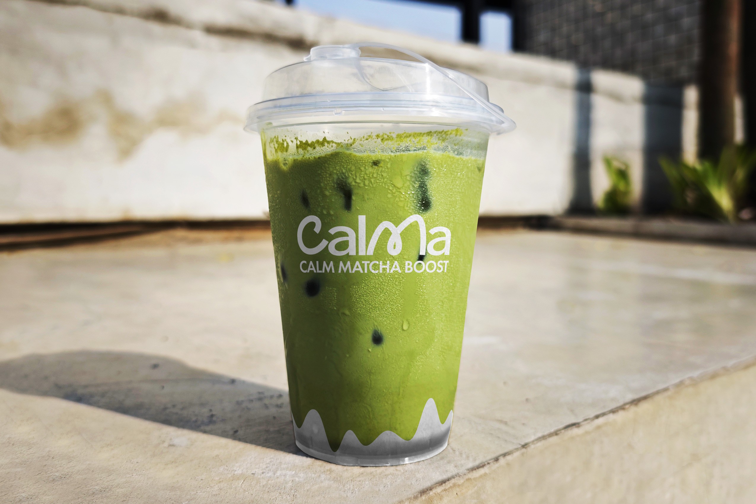 Minimalist coffee can design in hand – black and white packaging with bold typography