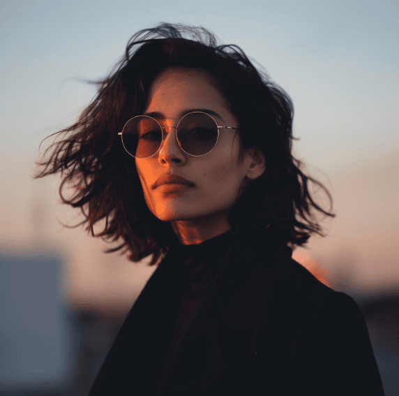 Woman in black glasses