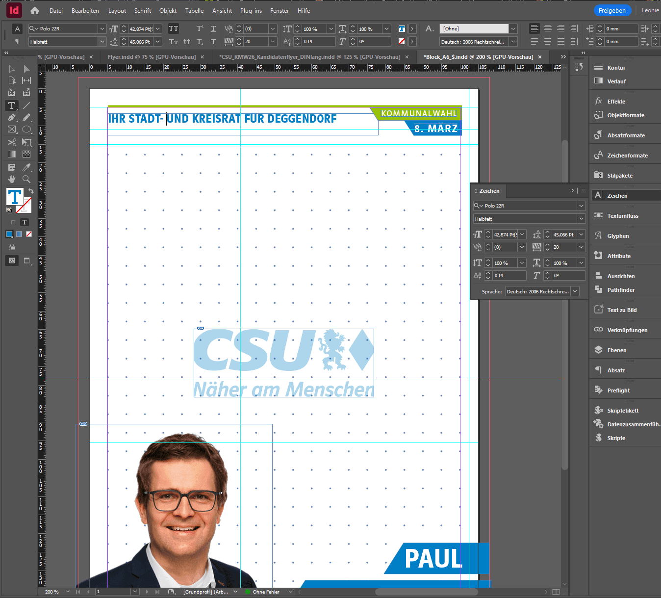 a close up of a red flower on a plant