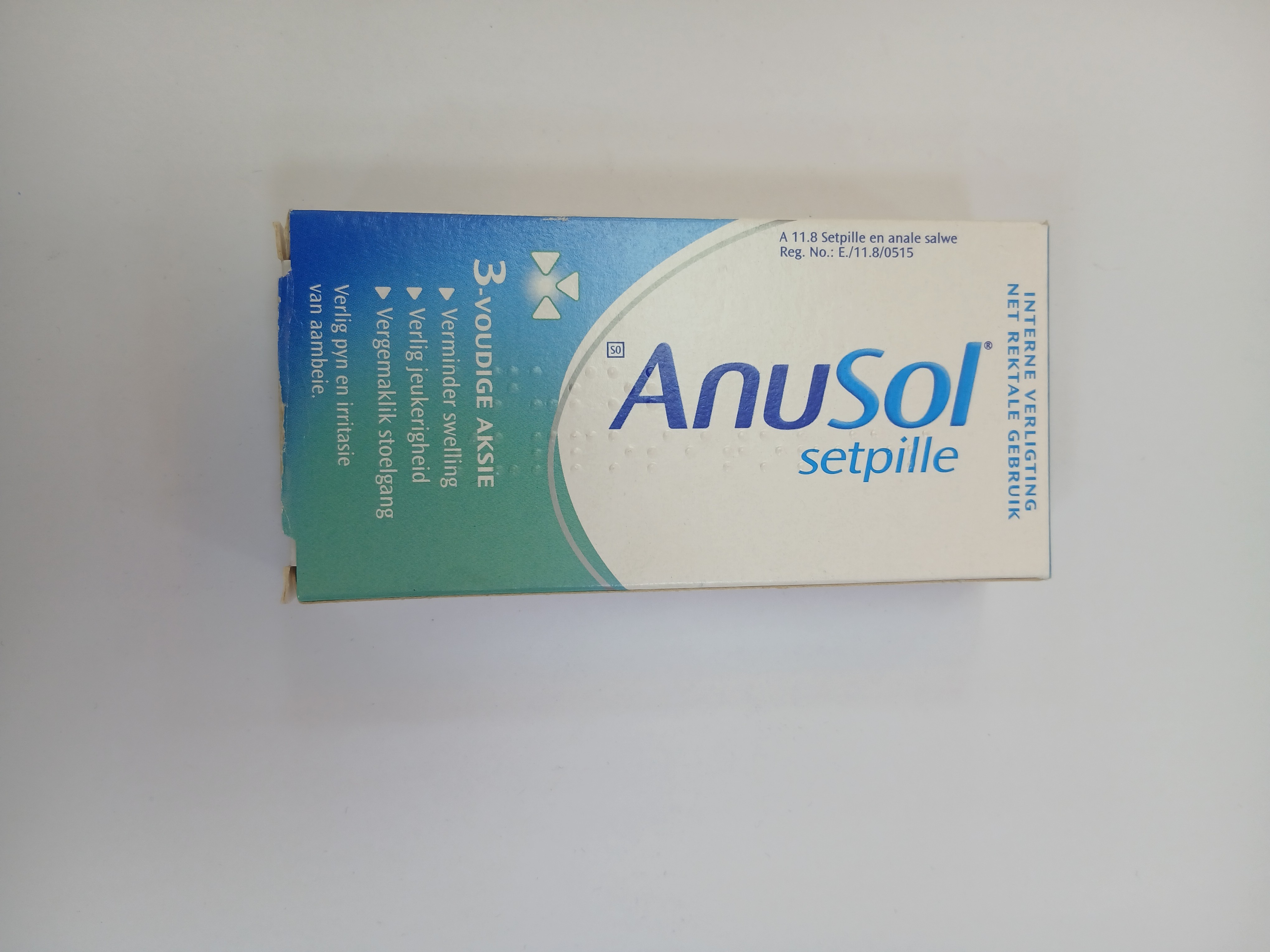AnuSol setpille, a white and green cardboard box for internal rectal use.