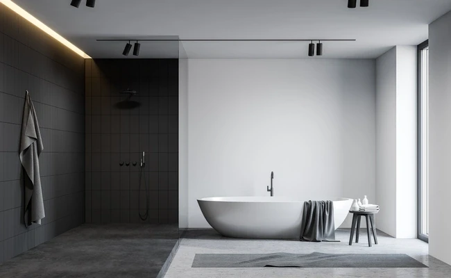 Bagno moderno con doccia walk-in, vasca bianca freestanding e design minimalista