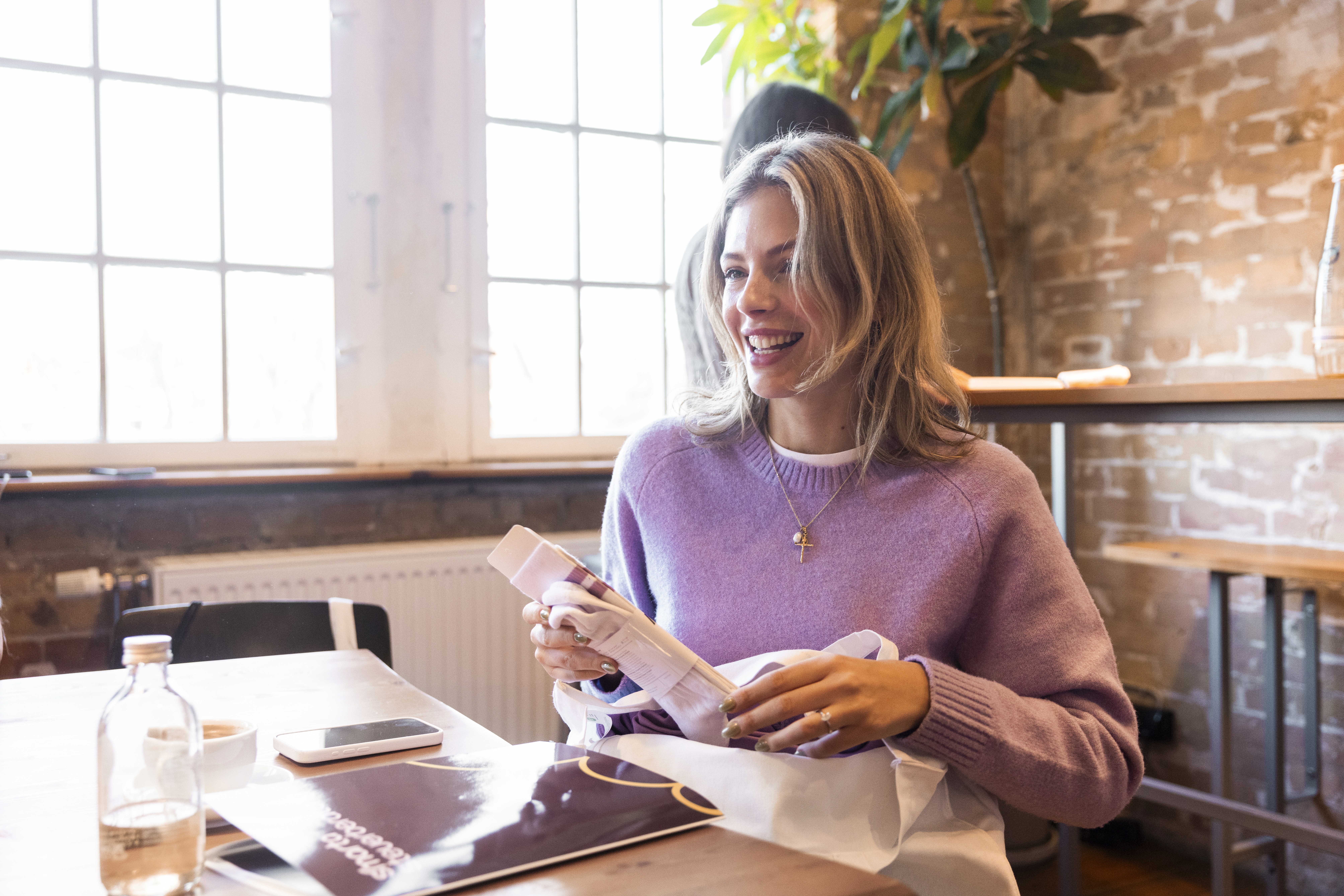 man in blue dress shirt and woman in black long sleeve shirt