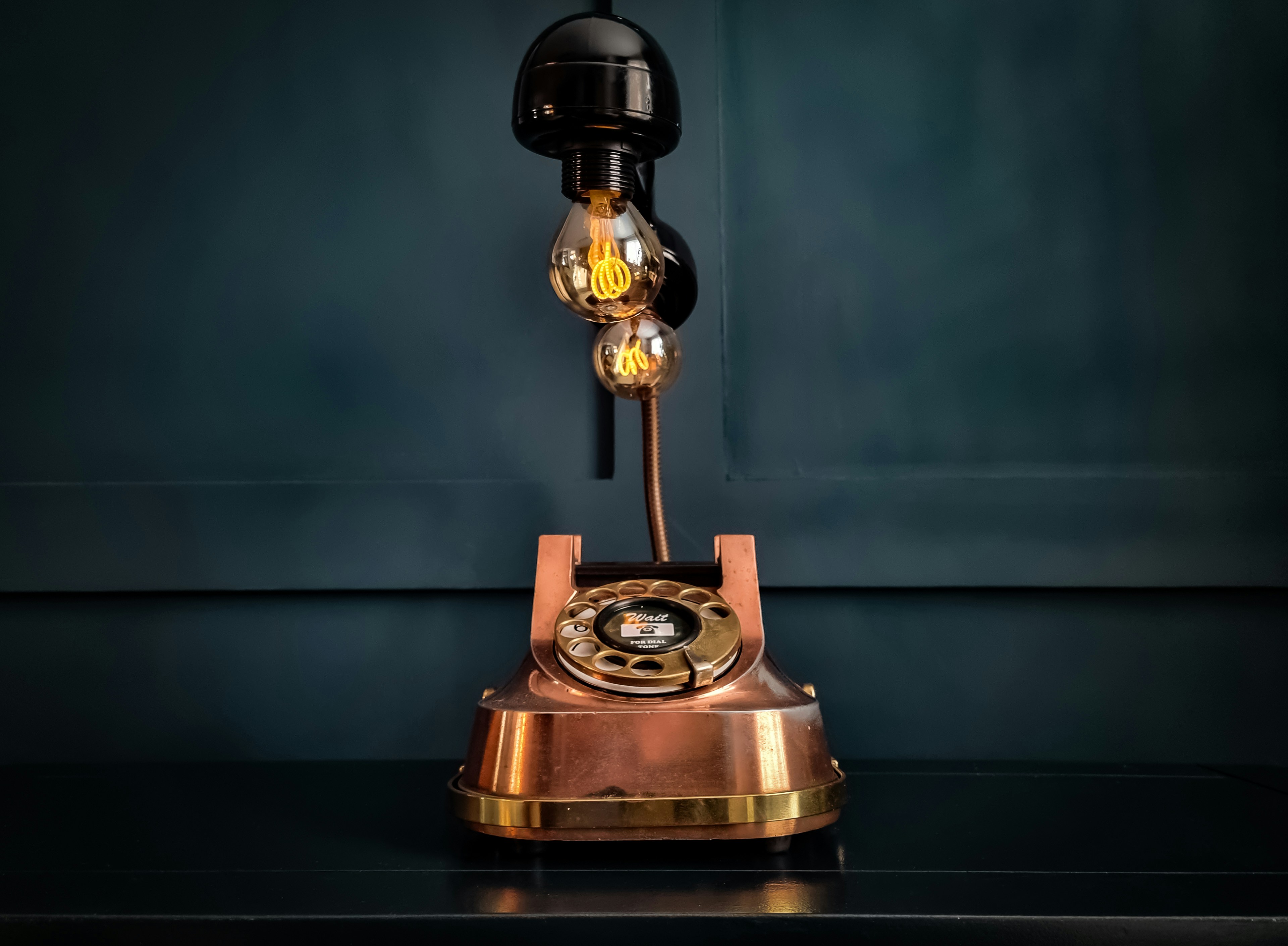 An old phone with lamps on it