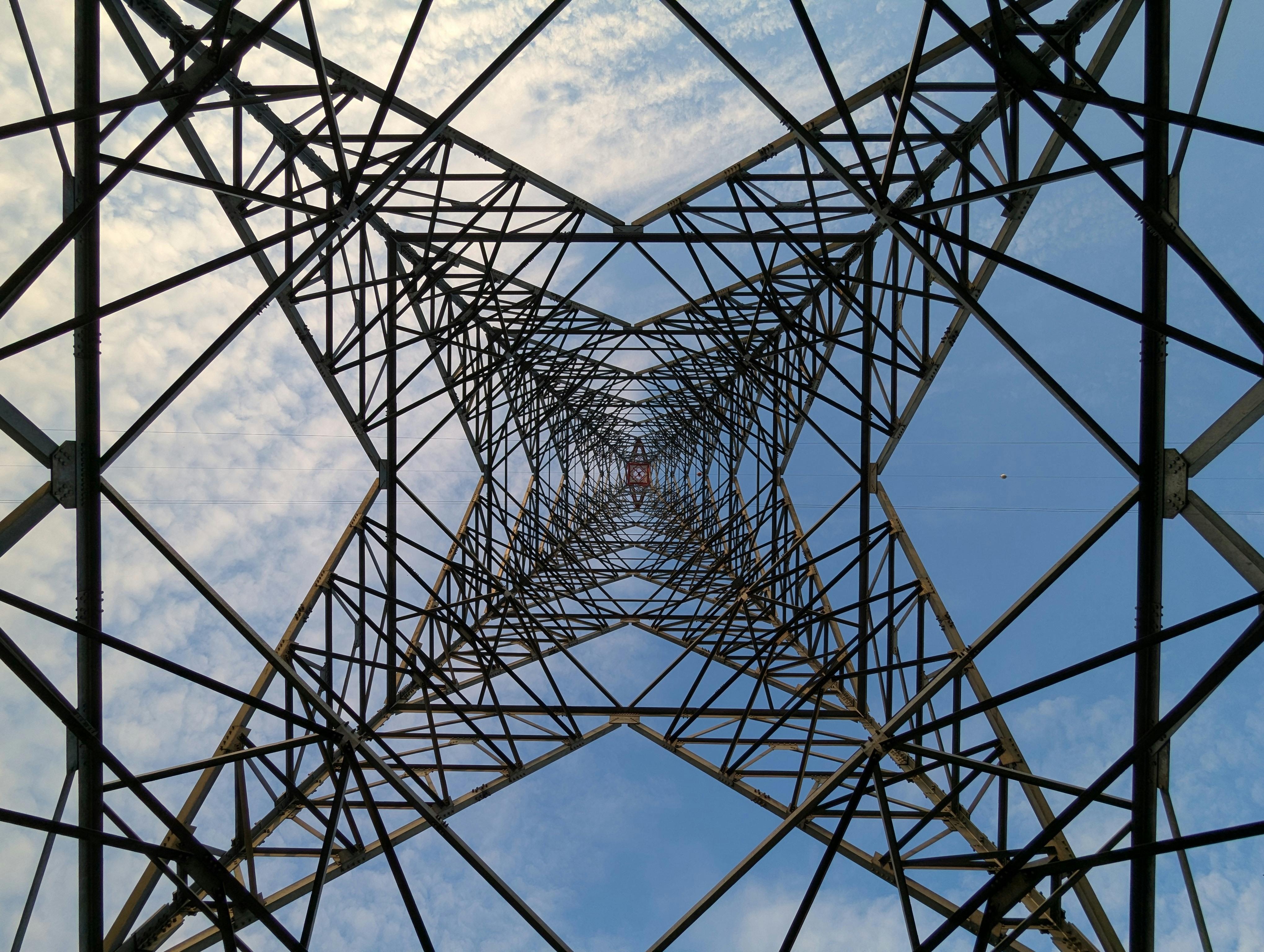 Seeing Systems - worm's eye view of a telephone tower depicting complex systems in the real world
