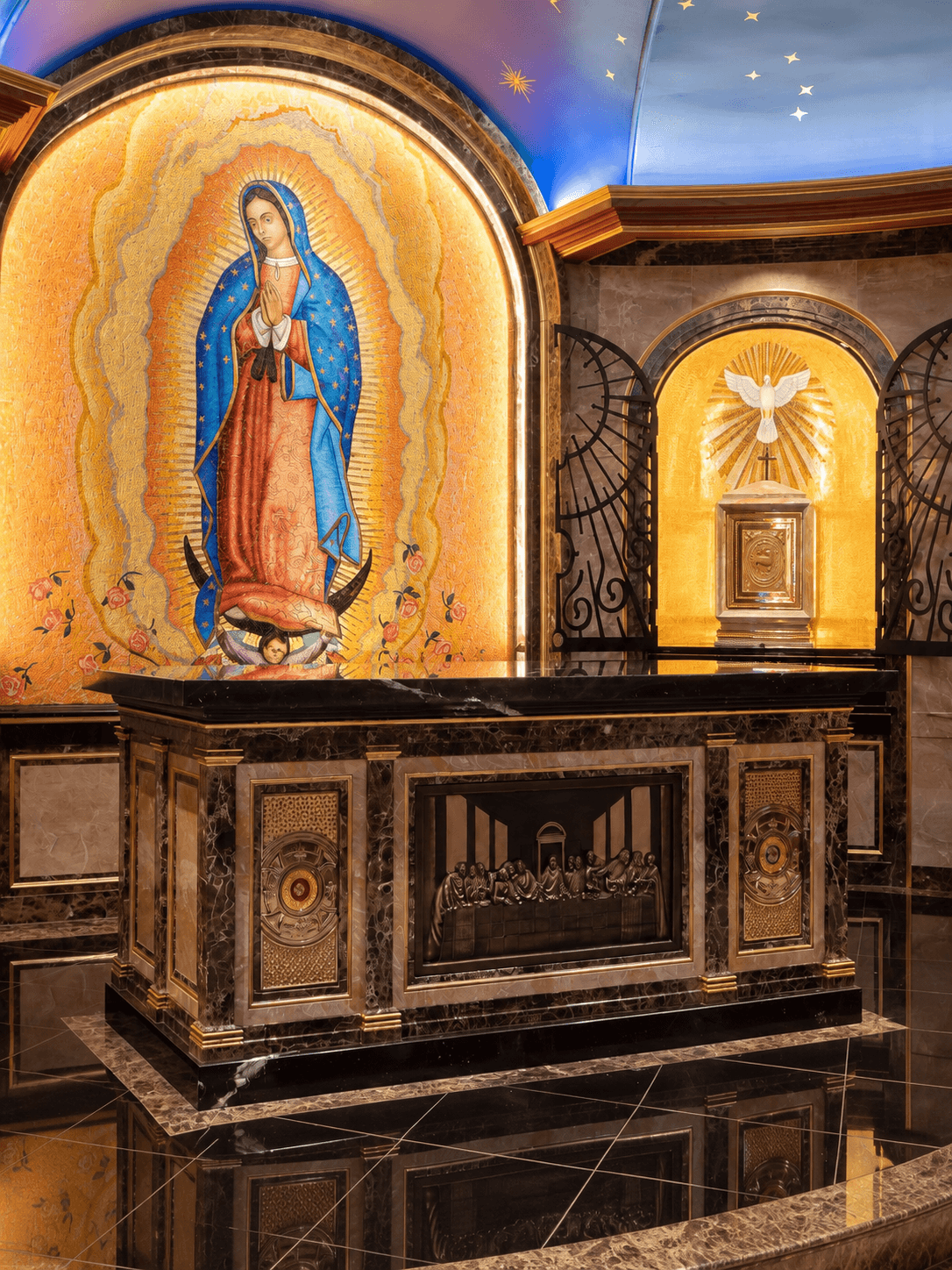 Our Lady of Guadalupe mosaic, altar, and tabernacle mosaic.