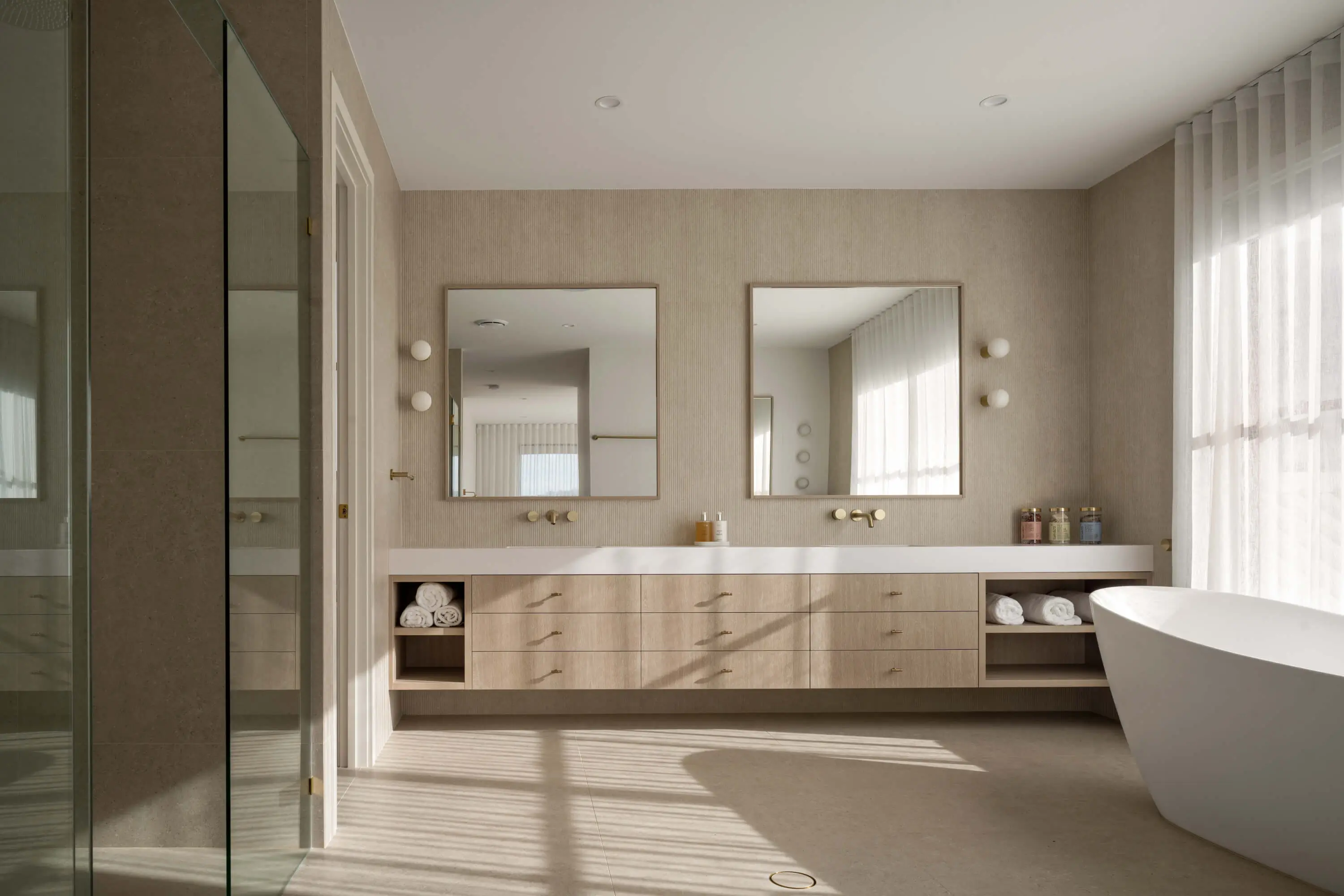 Minimalist ensuite design with custom timber vanity joinery