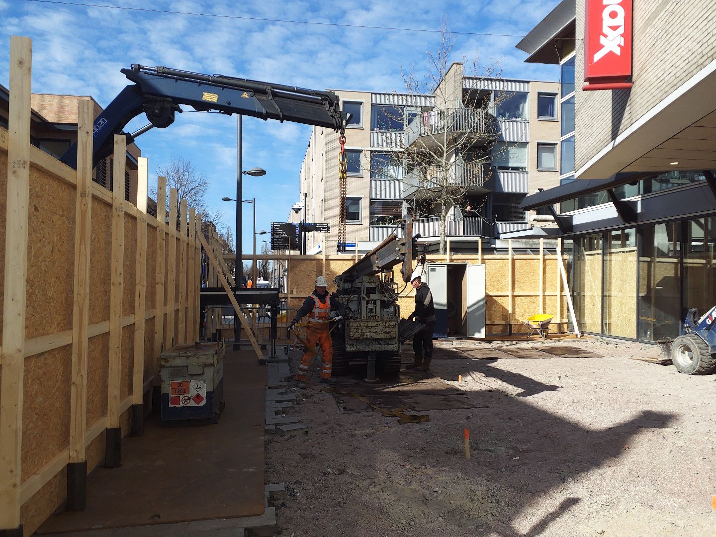 white wooden shelf near white wall