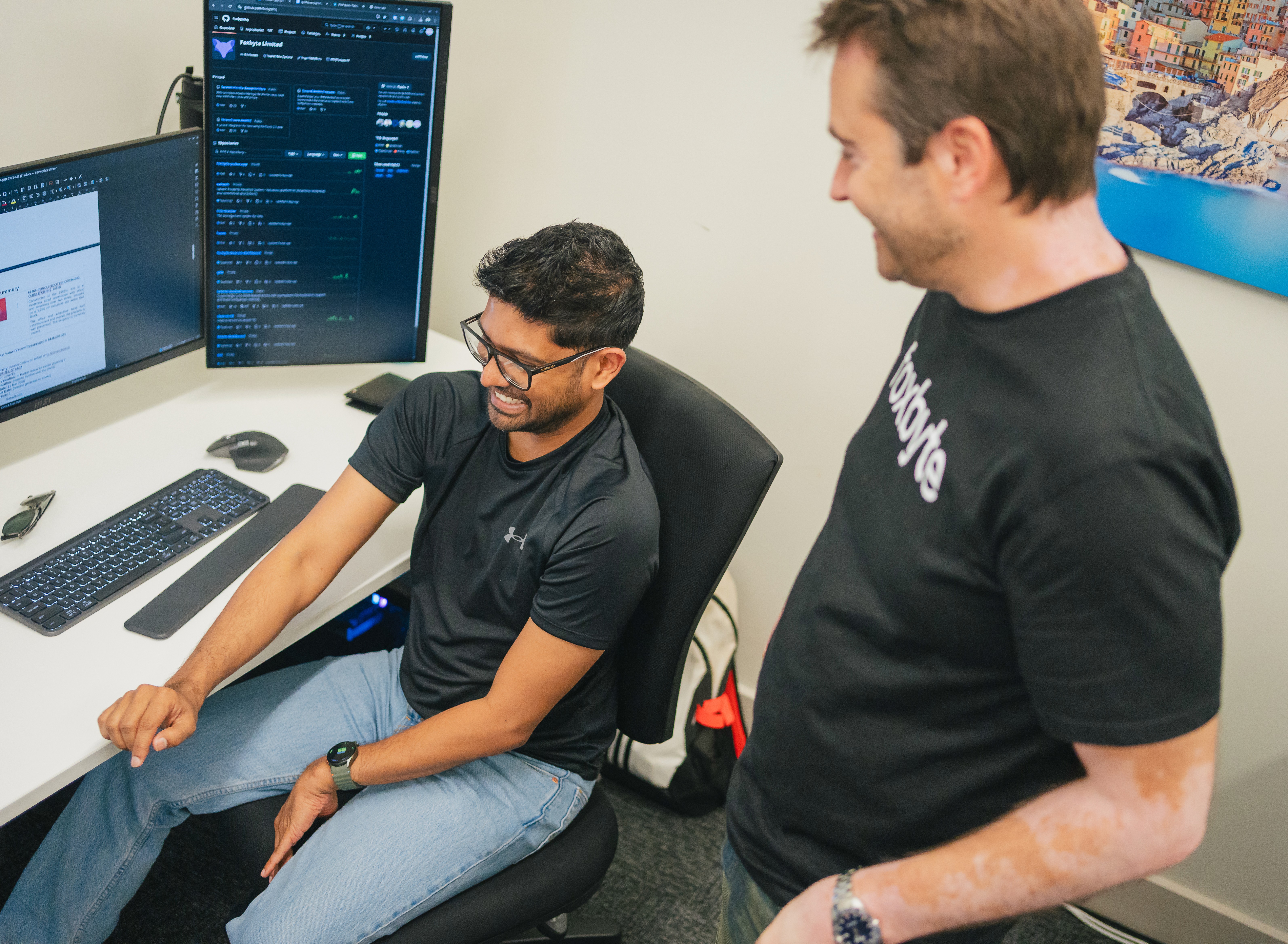Webfox team members in their Napier office – discussing and working on AI and digital strategy.