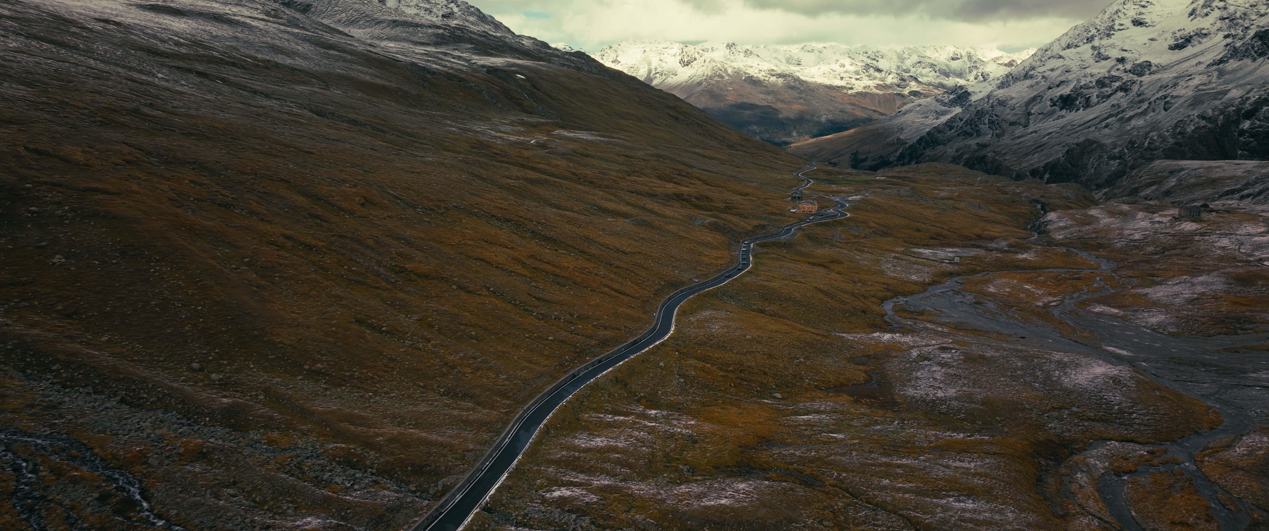 Streetside billboard with flyposters of the Batch.Works brand and illustrations