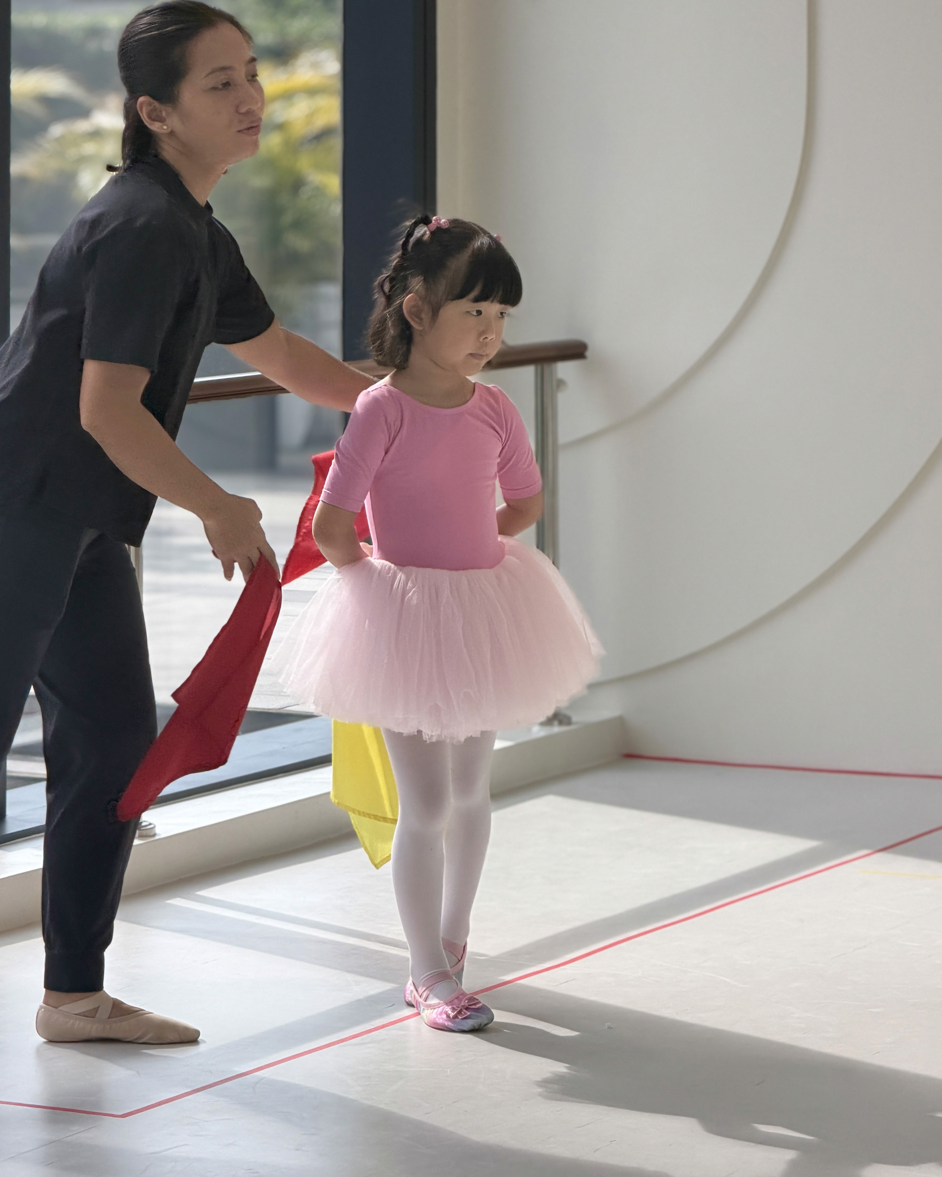 child ballerina wearing a pink dancing ballet tutu Rookids BGC
