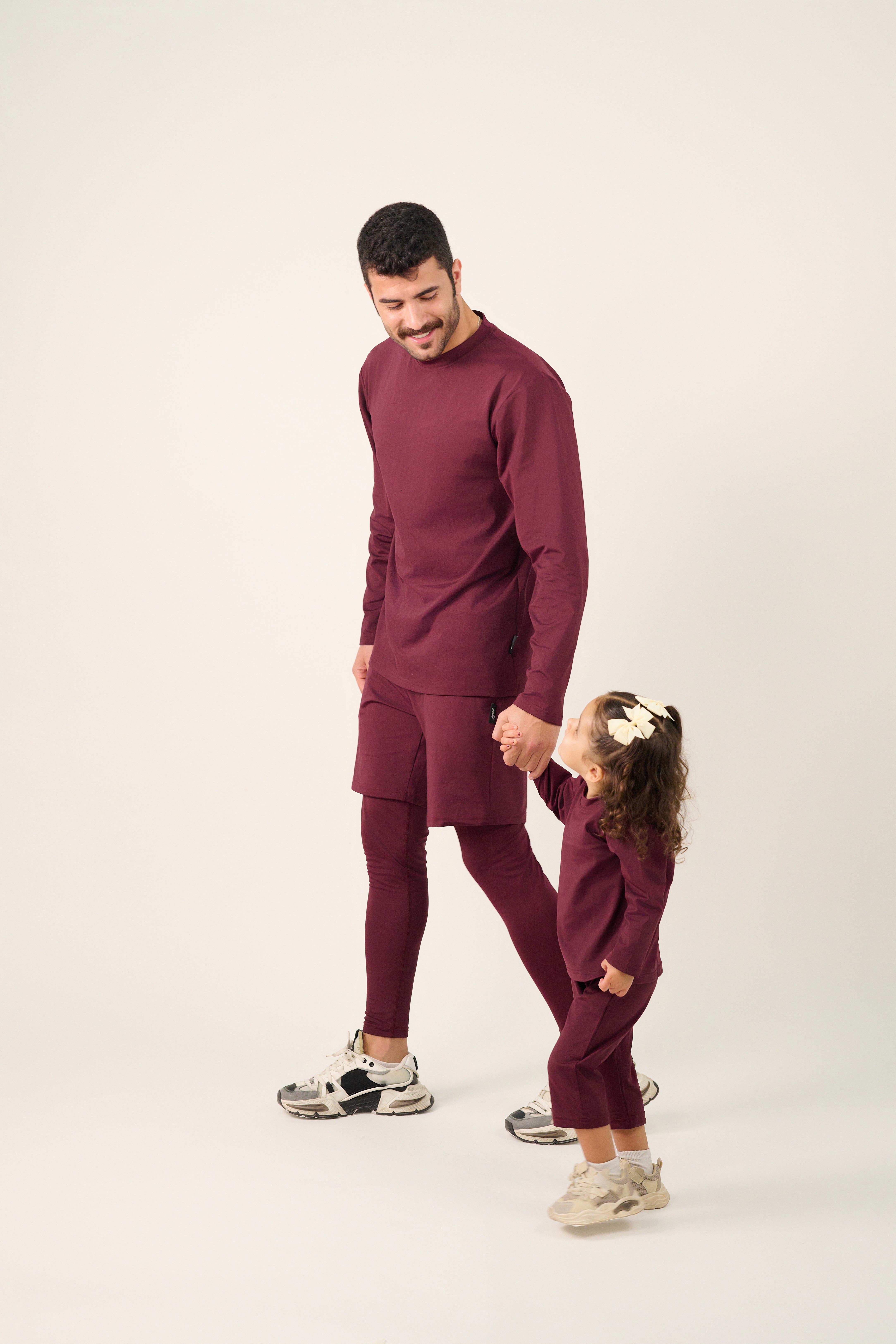 Friends laughing and posing inside a car