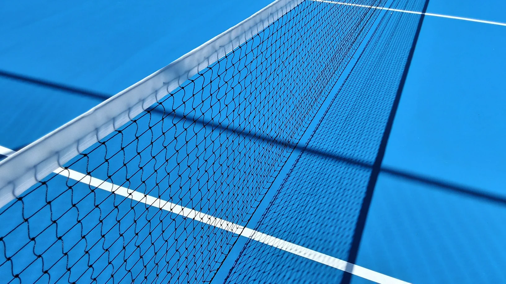 Blue hard court and net