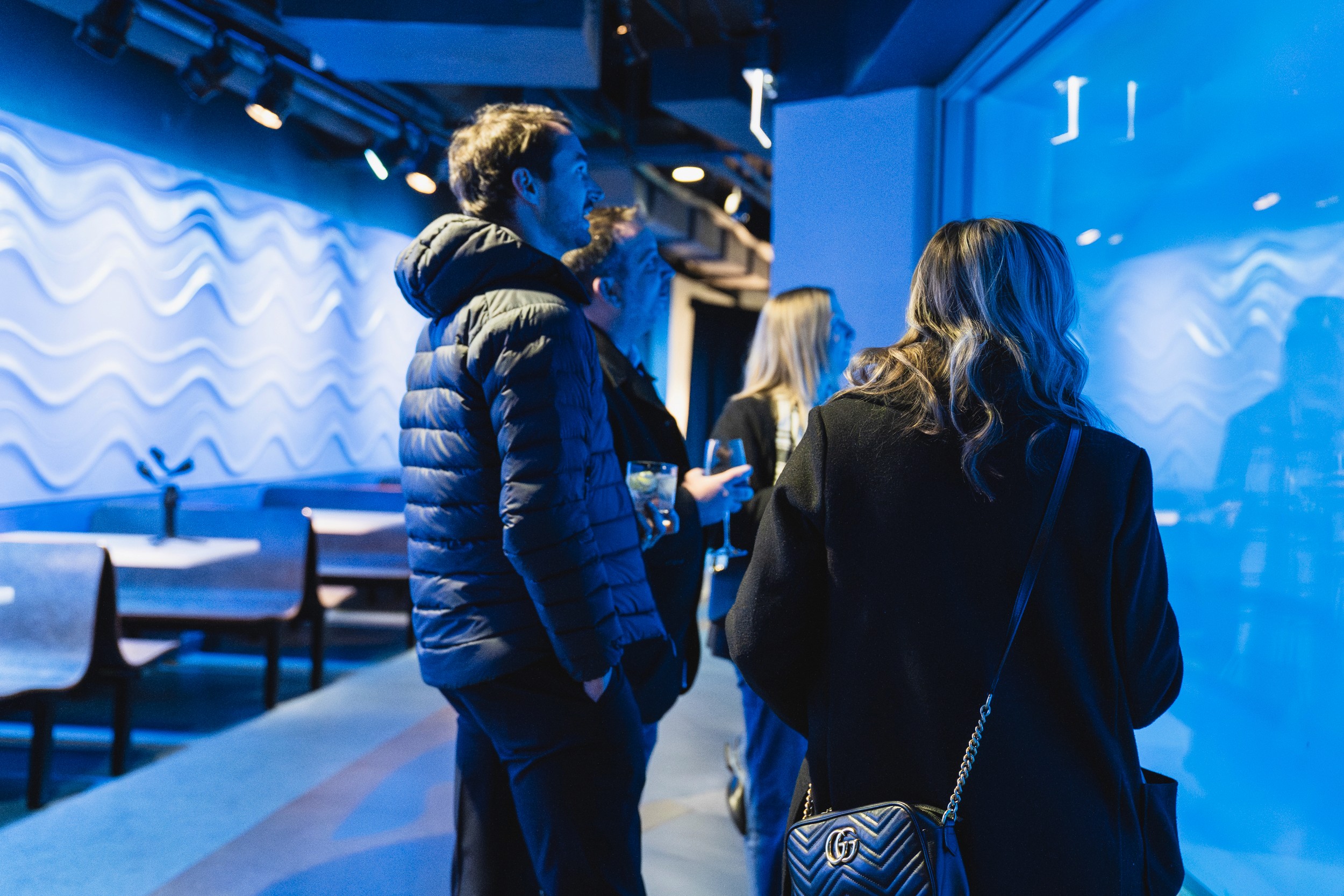 Guests viewing an underwater exhibit during Tether Supervision’s RSNA 2025 event at the Shedd Aquarium, part of the company’s hosted gatherings for radiologists, technologists, and imaging leaders.