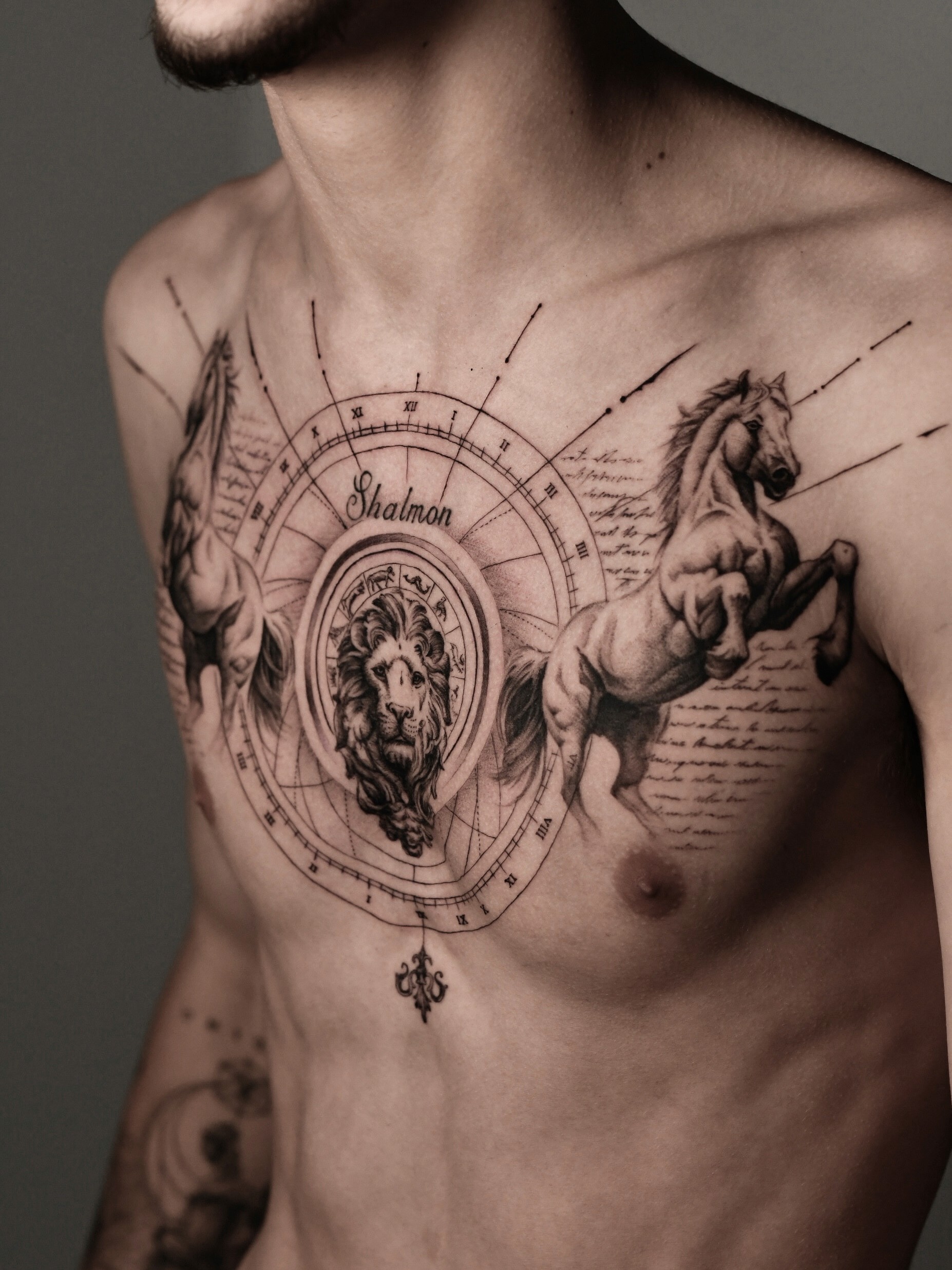 full chest piece tattoo oh horses and geometric shapes