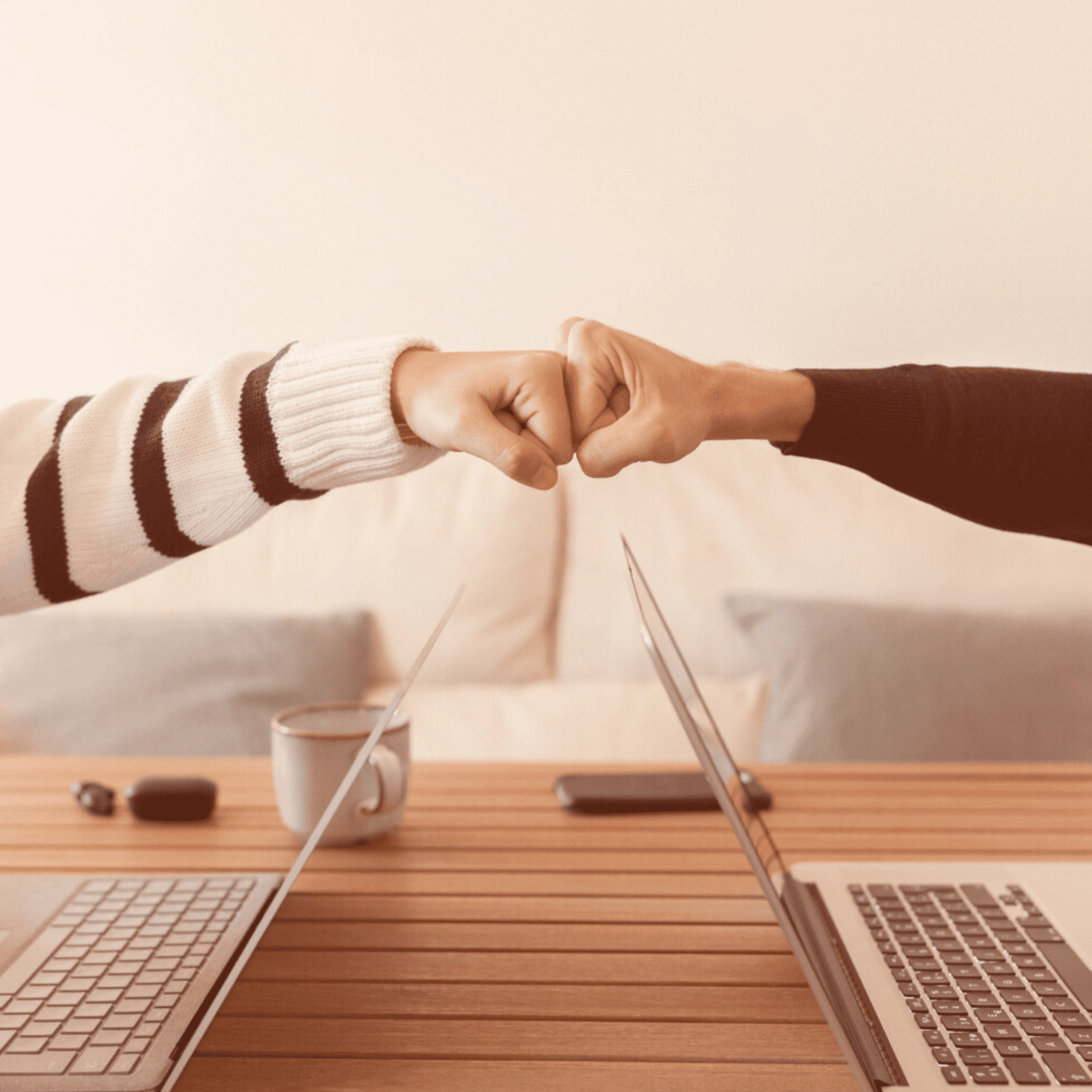 Business owner referring Pocket Office and sealing the deal with a fist bump.