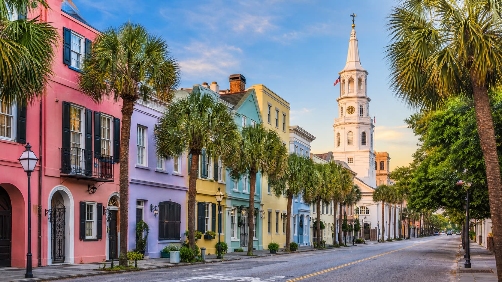 Charleston historic district with colorful houses and palm trees